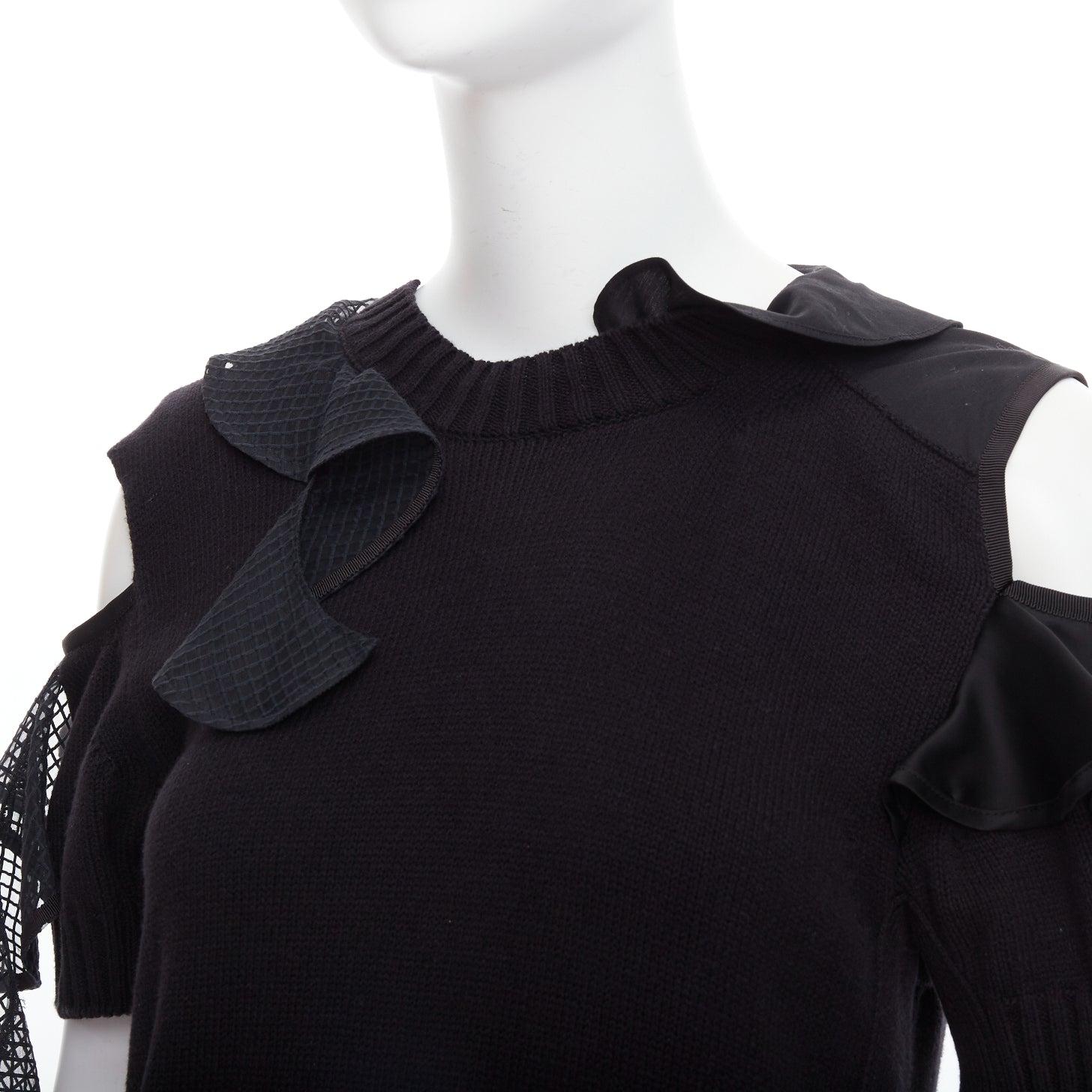 SACAI 2018 black cotton blend asymmetric ruffle hi low knitted dress JP1 S
Reference: LAYU/A00016
Brand: Sacai
Designer: Chitose Abe
Material: Cotton, Blend
Color: Black
Pattern: Solid
Closure: Pullover
Lining: Black 
Extra Details: Sacai Black Knit