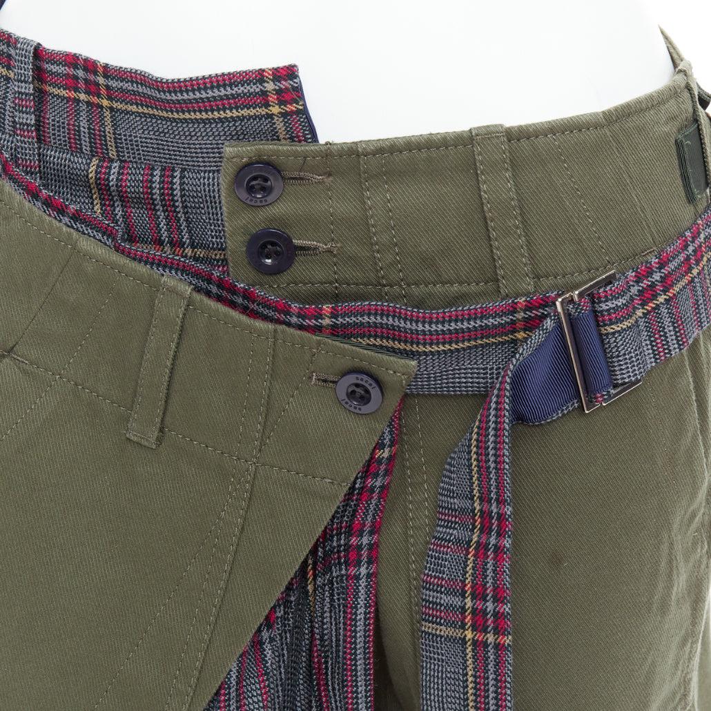 SACAI 2018 - Pantalon kilt à carreaux déconstruits en coton kaki JP2 M
Référence : VEHO/A00007
Marque : Sacai
Designer : Chitose Abe
Collection : 2018
Matière : Coton, laine
Couleur : Vert, Multicolore
Motif : damier
Fermeture : bouton
Détails