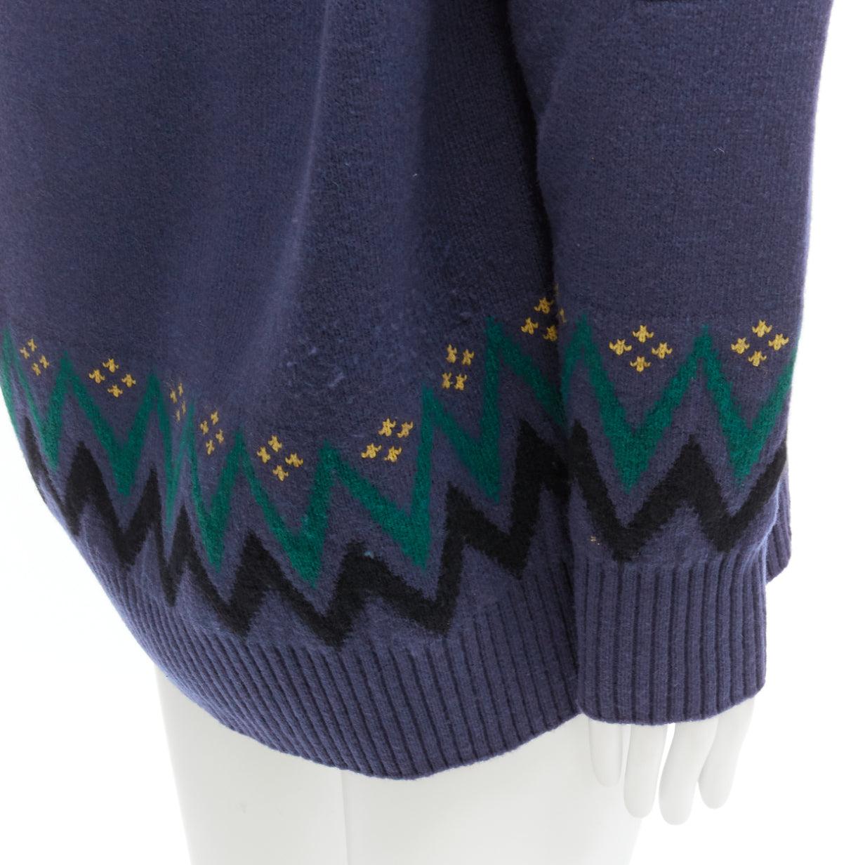 SACAI 2018 navy cotton blend fairisle knit sweater hyrid hoodie JP3 L
Reference: CAWG/A00300
Brand: Sacai
Designer: Chitose Abe
Collection: 2018
Material: Cotton, Blend
Color: Navy, Multicolour
Pattern: Fair Isle
Closure: Pullover
Extra Details: