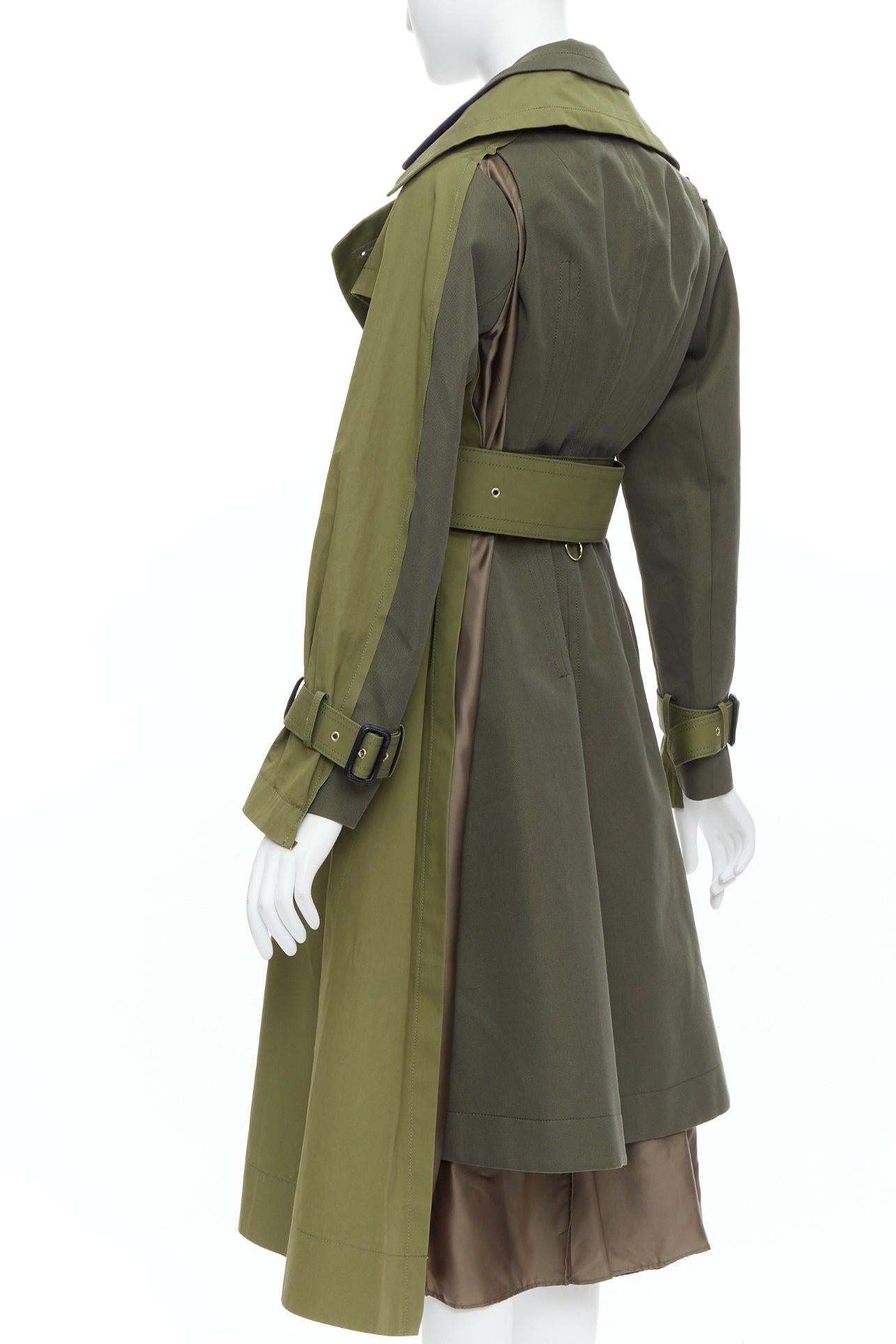 SACAI 2020 green cotton gabardine double layered belted trench coat JP1 S
Reference: LAYU/A00003
Brand: Sacai
Designer: Chitose Abe
Collection: 2020 Resort
Material: Cotton
Color: Khaki
Pattern: Solid
Closure: Belt
Lining: Green Fabric
Extra