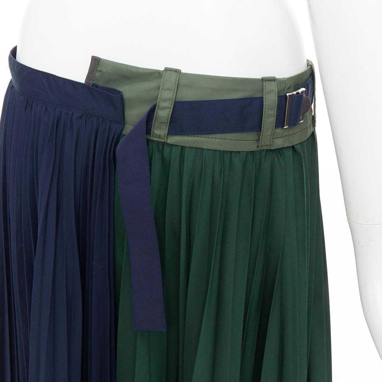 SACAI 2020 green navy nylon trim deconstructed pleated skirt JP3 L
Reference: KNLM/A00325
Brand: Sacai
Designer: Chitose Abe
Collection: 2020
Material: Polyester, Blend, Nylon
Color: Green, Navy
Pattern: Solid
Closure: Belt
Made in: