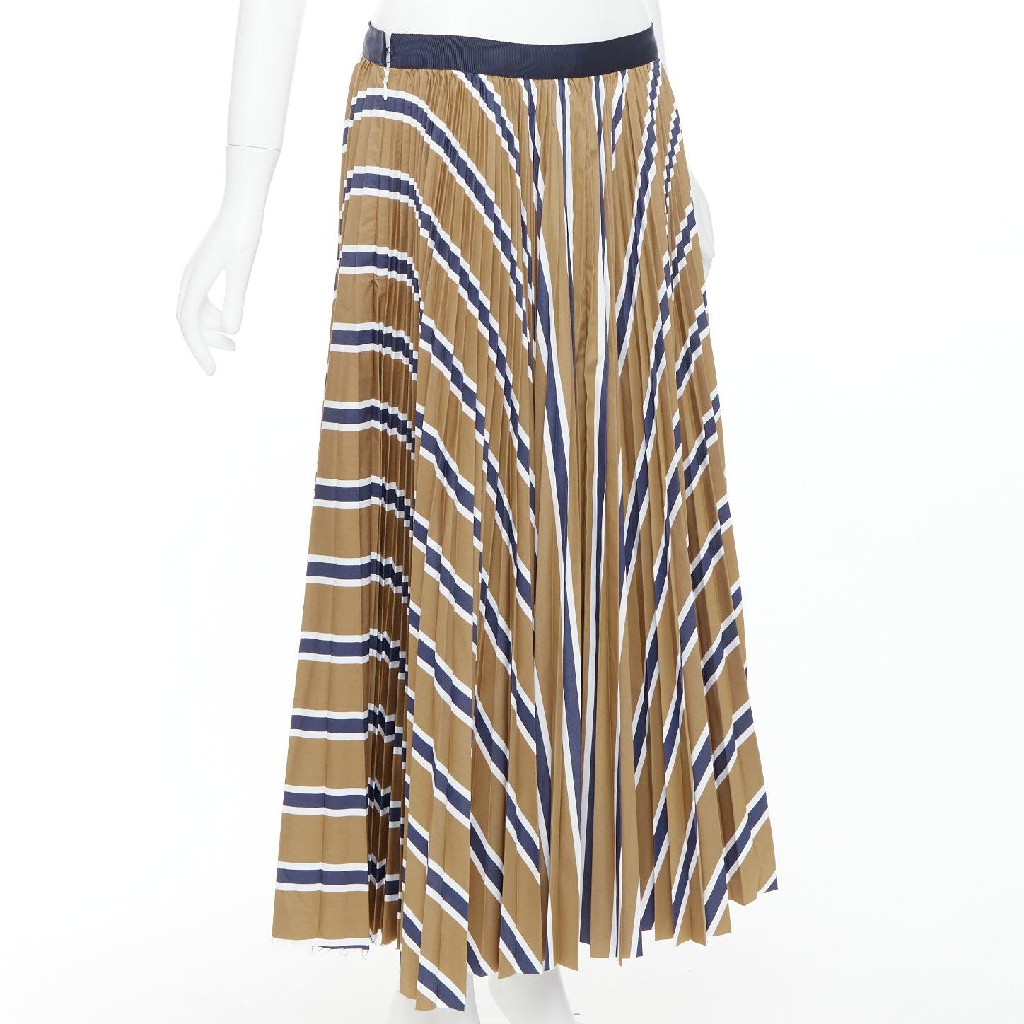 SACAI 2020 navy brown white striped pleated ribbon waist skirt JP4 XL
Reference: KNLM/A00328
Brand: Sacai
Designer: Chitose Abe
Collection: 2020
Material: Polyester, Blend
Color: Brown, Navy
Pattern: Striped
Closure: Zip
Extra Details: Frayed edge