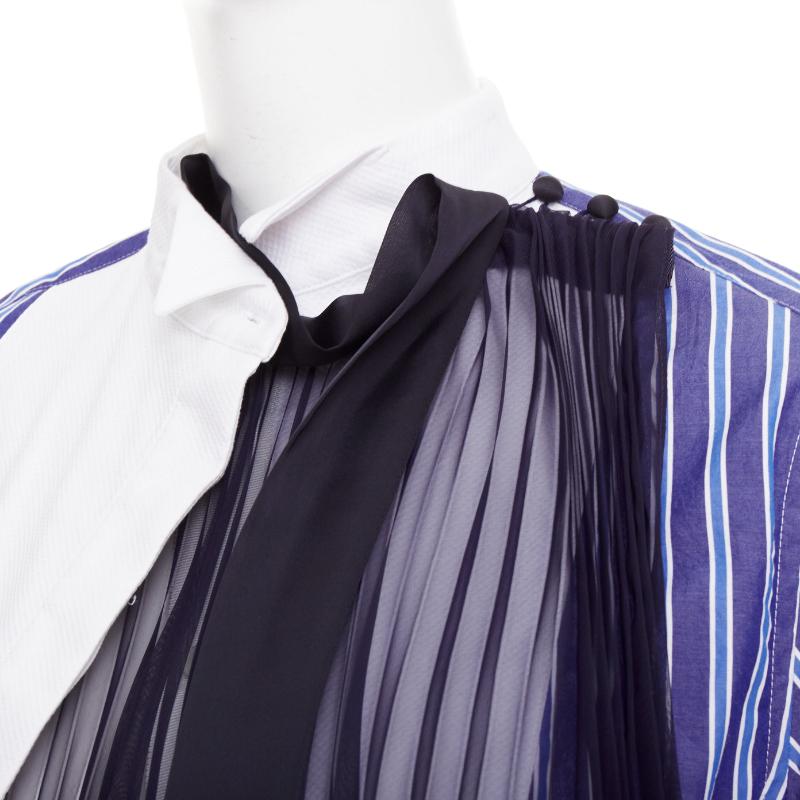 SACAI 2021 blue striped cotton bib collar sheer panel deconstructed shirt JP1 S
Reference: NKLL/A00567
Brand: Sacai
Designer: Chitose Abe
Collection: 2021
Material: Cotton
Color: White, Blue
Pattern: Striped
Closure: Button
Extra Details: Navy