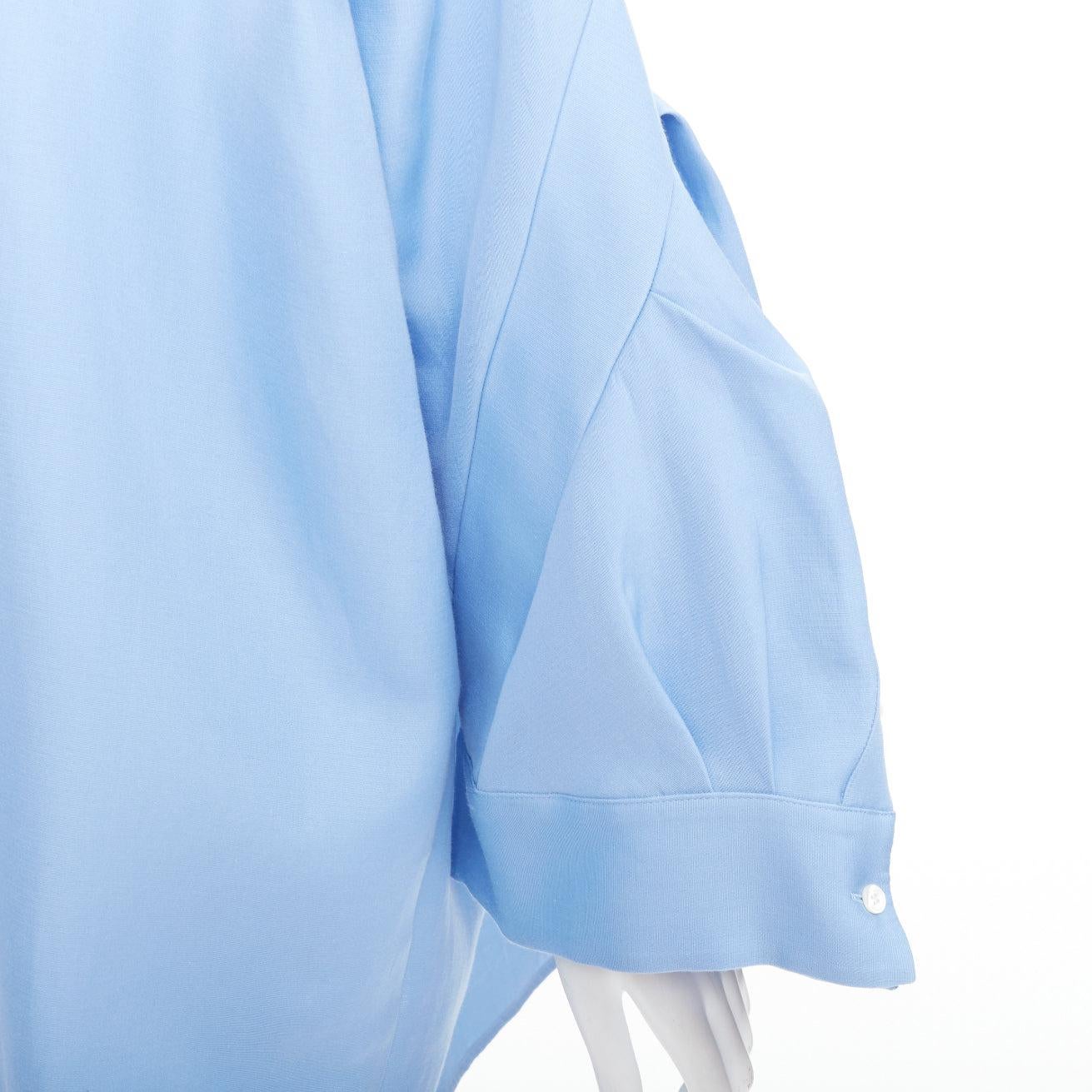 SACAI 2023 blue organza cotton exaggerated bell sleeves oversized shirt dress JP2 M
Reference: NKLL/A00516
Brand: Sacai
Designer: Chitose Abe
Collection: 2023
Material: Silk, Cotton
Color: Blue
Pattern: Solid
Closure: Button
Extra Details: Sacai