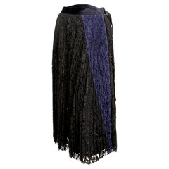 Used SACAI black and blue lace wrap skirt