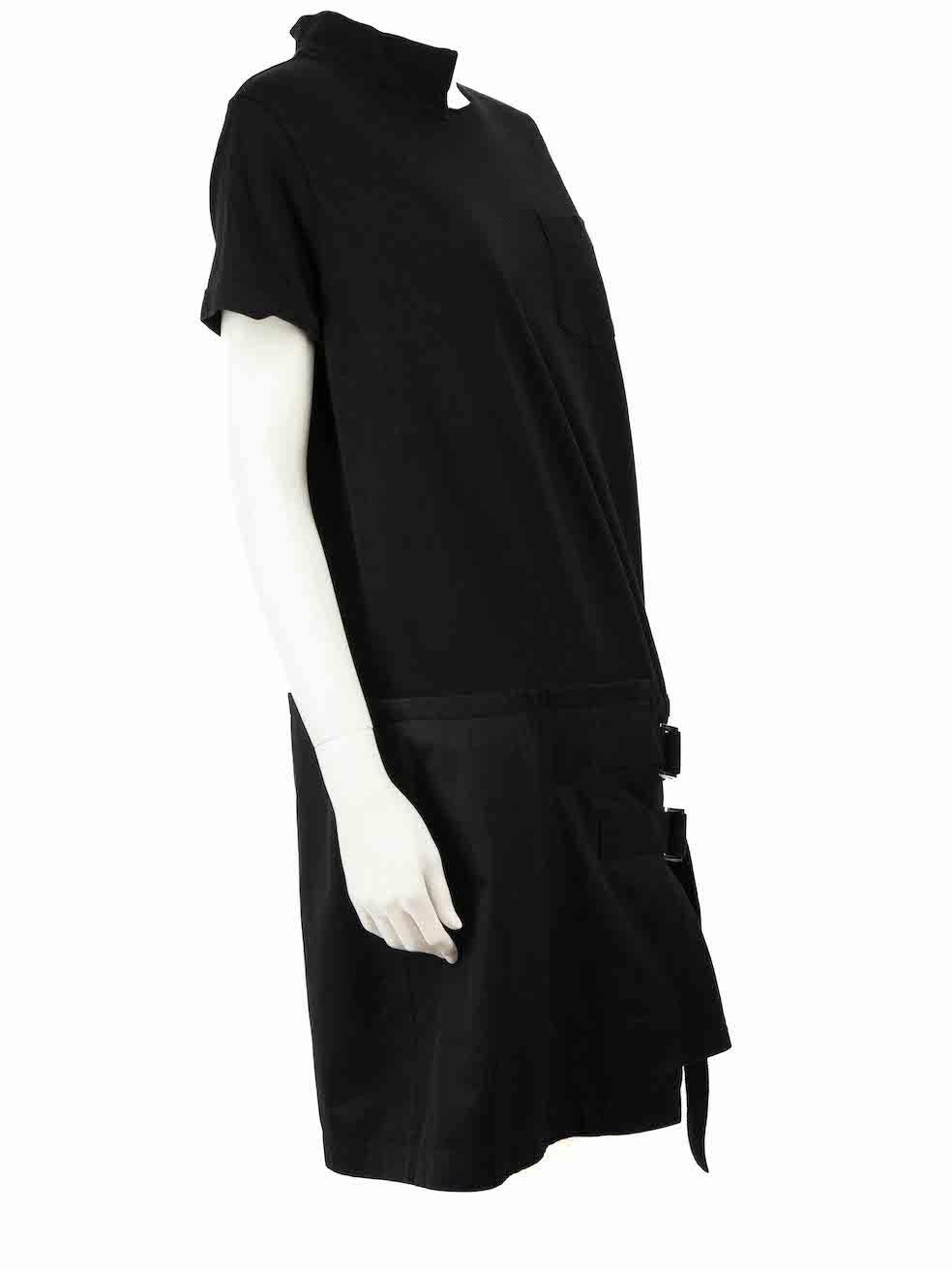 CONDITION is Very good. Hardly any visible wear to dress is evident on this used Sacai designer resale item.
 
 Details
 Black
 Cotton
 Dress
 Short sleeves
 Asymmetric round neck
 1x Pocket
 Skirt buckle detail
 
 
 Made in Japan
 
 Composition
