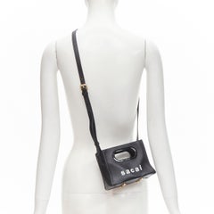 SACAI black leather white logo print crossbody micro shopper tote bag