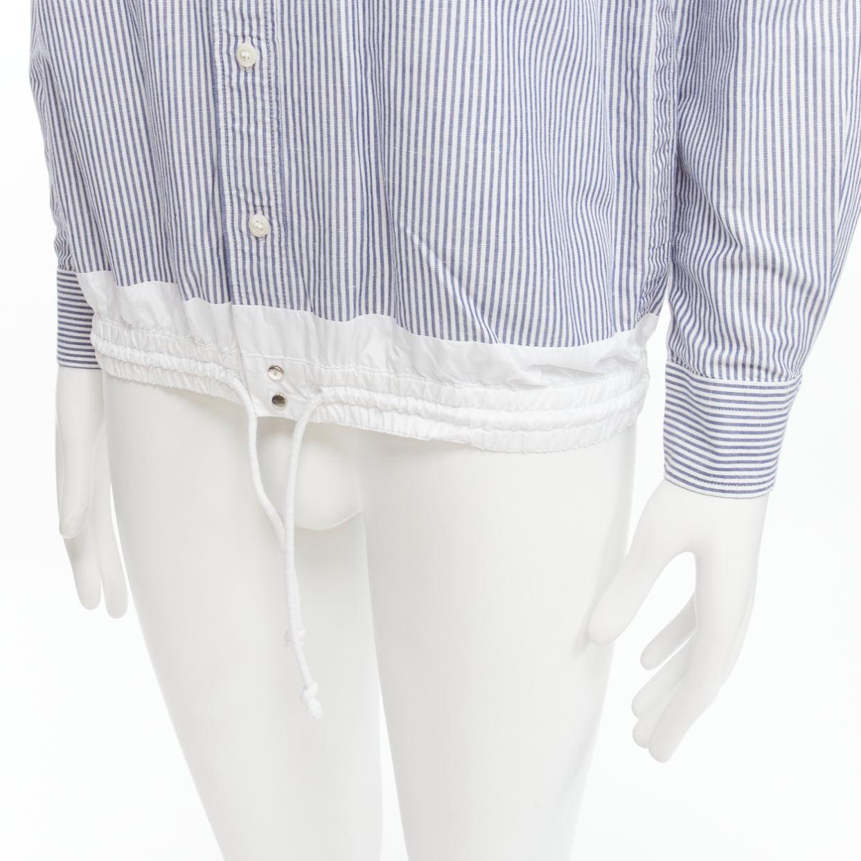 SACAI blue white striped cotton linen nylon drawstring shirt JP2 M
Reference: JSLE/A00053
Brand: Sacai
Designer: Chitose Abe
Material: Cotton, Linen
Color: White, Blue
Pattern: Striped
Closure: Button
Extra Details: Inverted pleat back.
Made in: