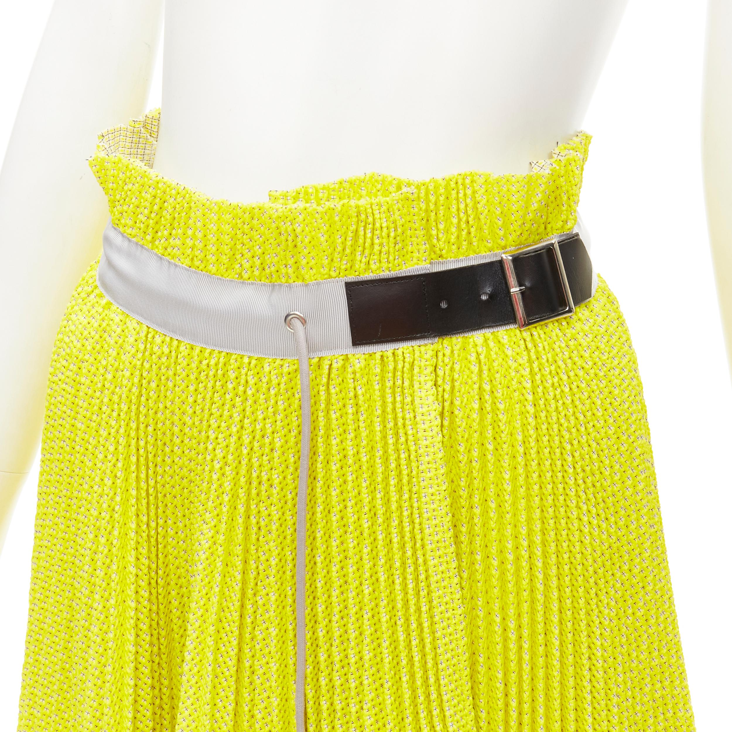 SACAI Chitose Abe yellow grey lattice deconstructed belted pleated skirt S
Brand: Sacai
Designer: Chitose Abe
Color: Yellow
Pattern: Solid
Closure: Buckle
Extra Detail: Faux leather buckle wrap skirt. Decorative drawstring detail. Thick lattice