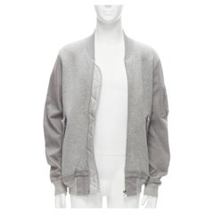 SACAI Graue lässige Bomberjacke mit kontrastierenden Ärmeln aus Jersey JP2 M
