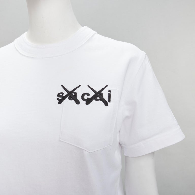 SACAI KAWS XX logo embroidery pocket white cotton boxy tshirt JP0 XS For  Sale at 1stDibs