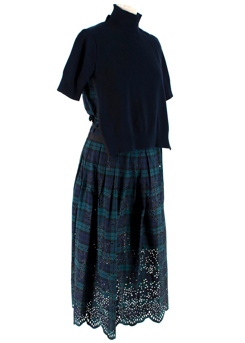 Sacai Navy Knitted & Tartan Dress

- Tartan design on the skirt with green and navy hues
- Ribbed navy knitted top with high neckline
- Cropped sleeves
- Black ribbed ribbon hemlines
- Cobalt blue button fasten on the top 
- Skirt has laser cut leaf