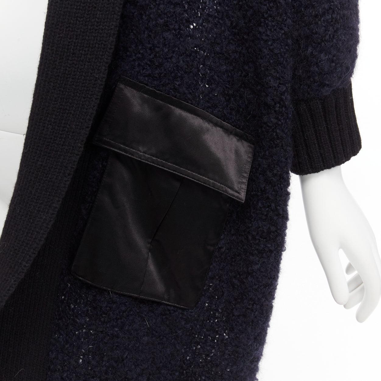 Sacai Luck navy black boucle wool alpaca patch pocket cardigan JP2 M
Riferimento: DYTG/A00047
Marchio: Sacai
Designer: Chitose Abe
Collection'S: LUCK
Materiale: Lana, alpaca, misto
Colore: Blu, Nero
Modello: Tinta unita
Dettagli extra: Tasche con