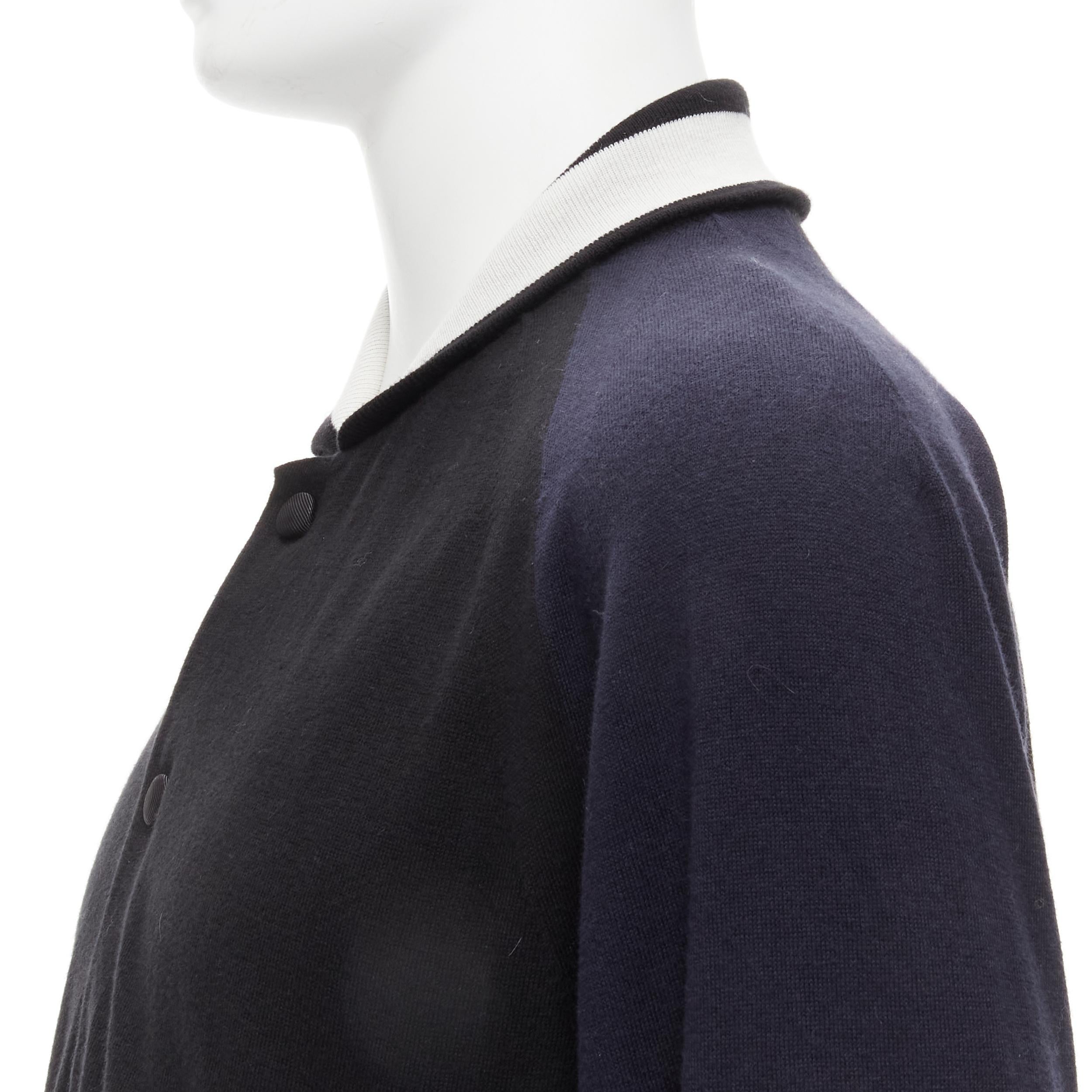 SACAI navy black cotton cashmere blend white raglan bomber JP2 M
Reference: YNWG/A00100
Brand: Sacai
Designer: Chitose Abe
Material: Cotton, Cashmere
Color: Navy, Black
Pattern: Solid
Closure: Snap Buttons
Lining:  Fabric
Extra Details: Slit pockets