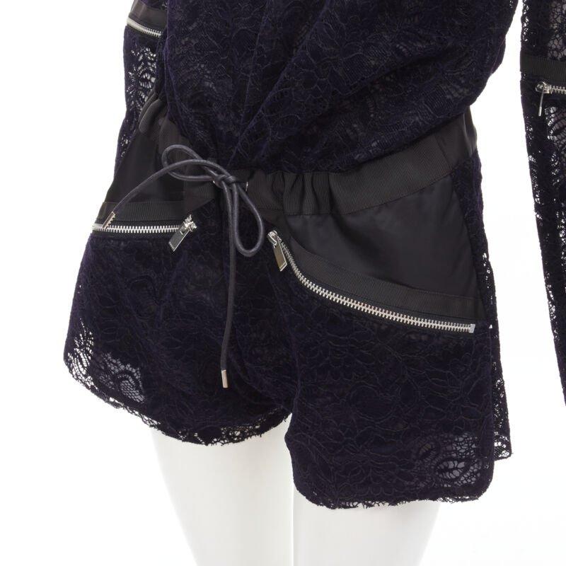 SACAI navy velvet floral lace pink zipper trim romper playsuit S
Reference: ANWU/A00820
Brand: Sacai
Designer: Chitose Abe
Color: Navy, Black
Pattern: Floral
Closure: Zip
Extra Details: Exposed silver-tone zip detailing. Velvet trim neckline.