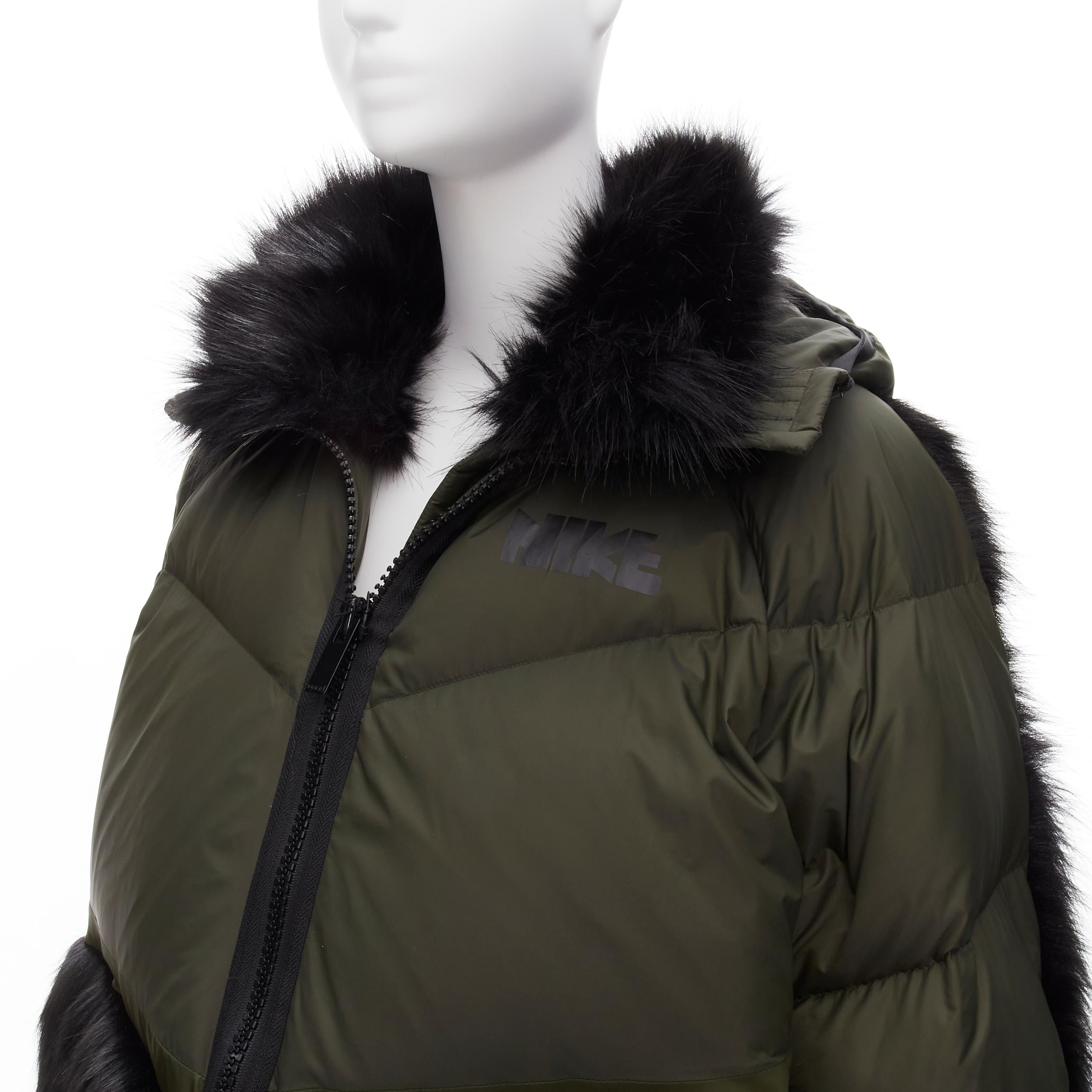 SACAI NIKE dark green black faux fur hooded puffer padded jacket S
Reference: CECU/A00023
Brand: Sacai
Designer: Chitose Abe
Model: S#CT3267
Collection: Nike
Material: Nylon, Faux Fur
Color: Green, Black
Pattern: Solid
Closure: Zip
Lining: Green