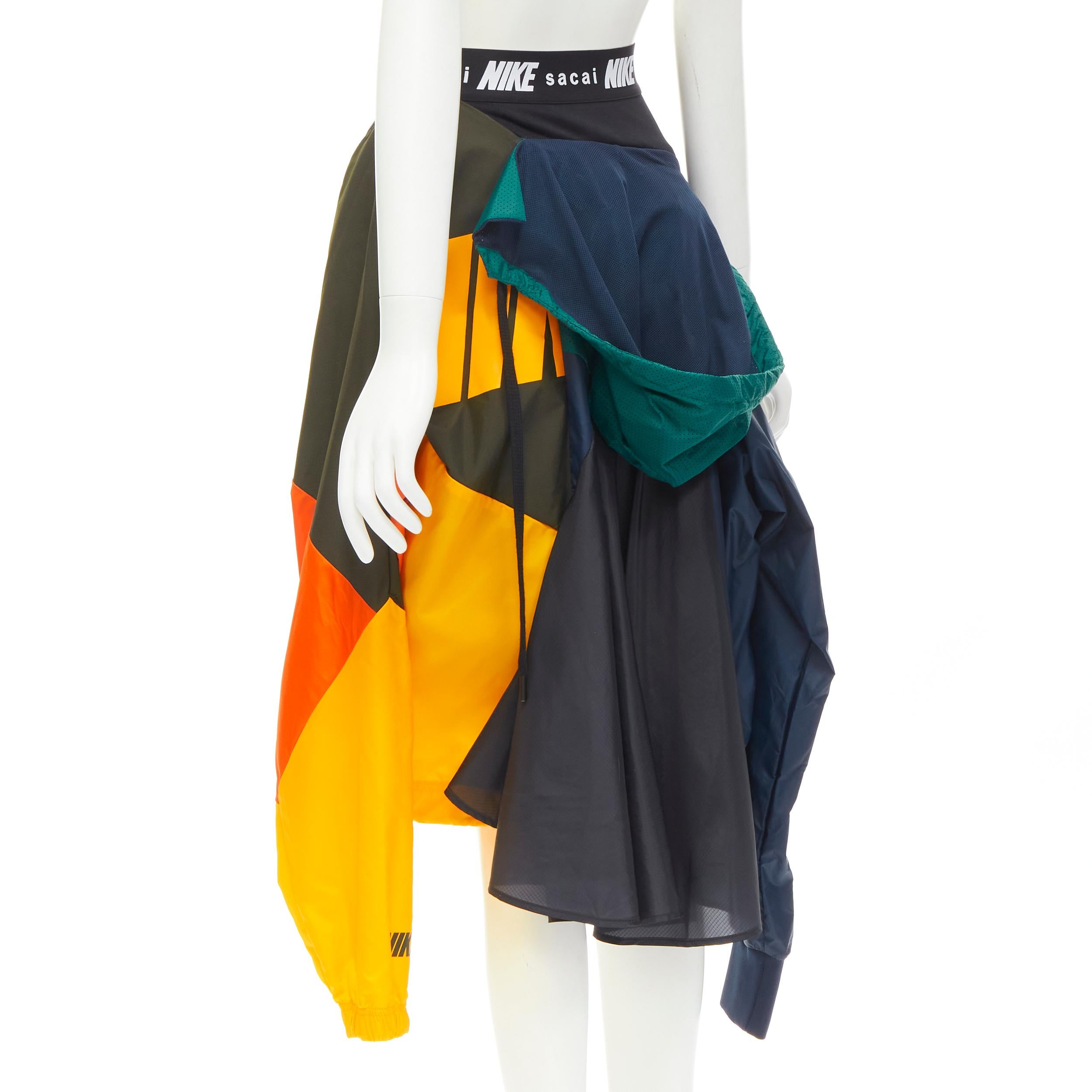Black SACAI NIKE deconstructed windbreaker patchwork draped skirt XXS For Sale