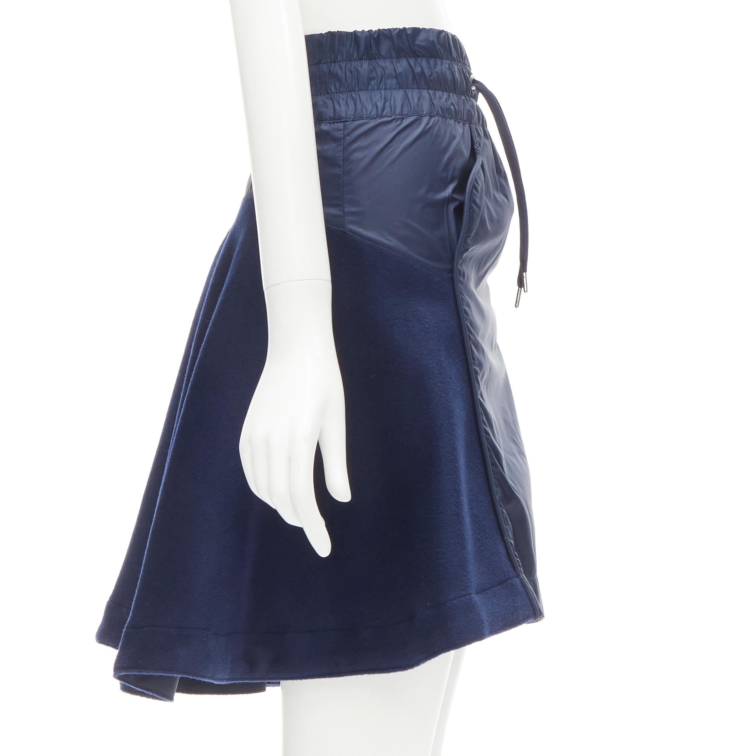Blue SACAI NIKE navy blue nylon wool kick flared back skirt S For Sale