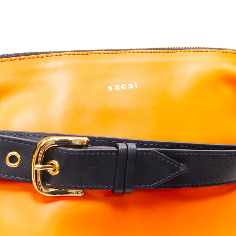 SACAI orange leather navy belt strap gold logo crossbody bag For Sale ...