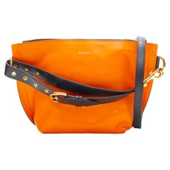 SACAI orange leather navy belt strap gold logo crossbody bag