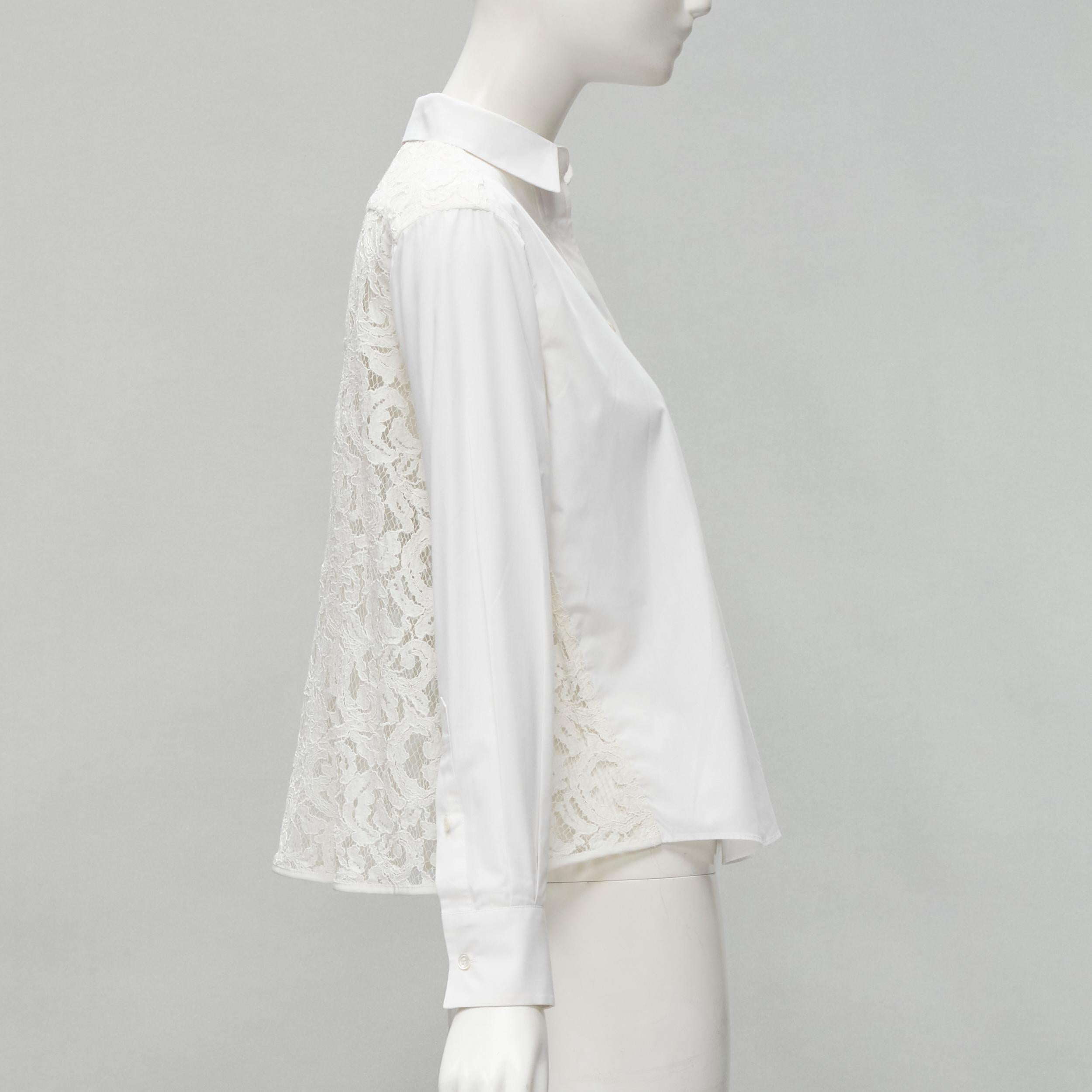 SACAI white cotton floral lace flared back button up shirt JP1 S
Brand: Sacai
Designer: Chitose Abe
Collection: 2016 
Material: Cotton
Color: White
Pattern: Solid
Closure: Button
Extra Detail: Grosgrain trimmed along placket. Flared lace back.
Made