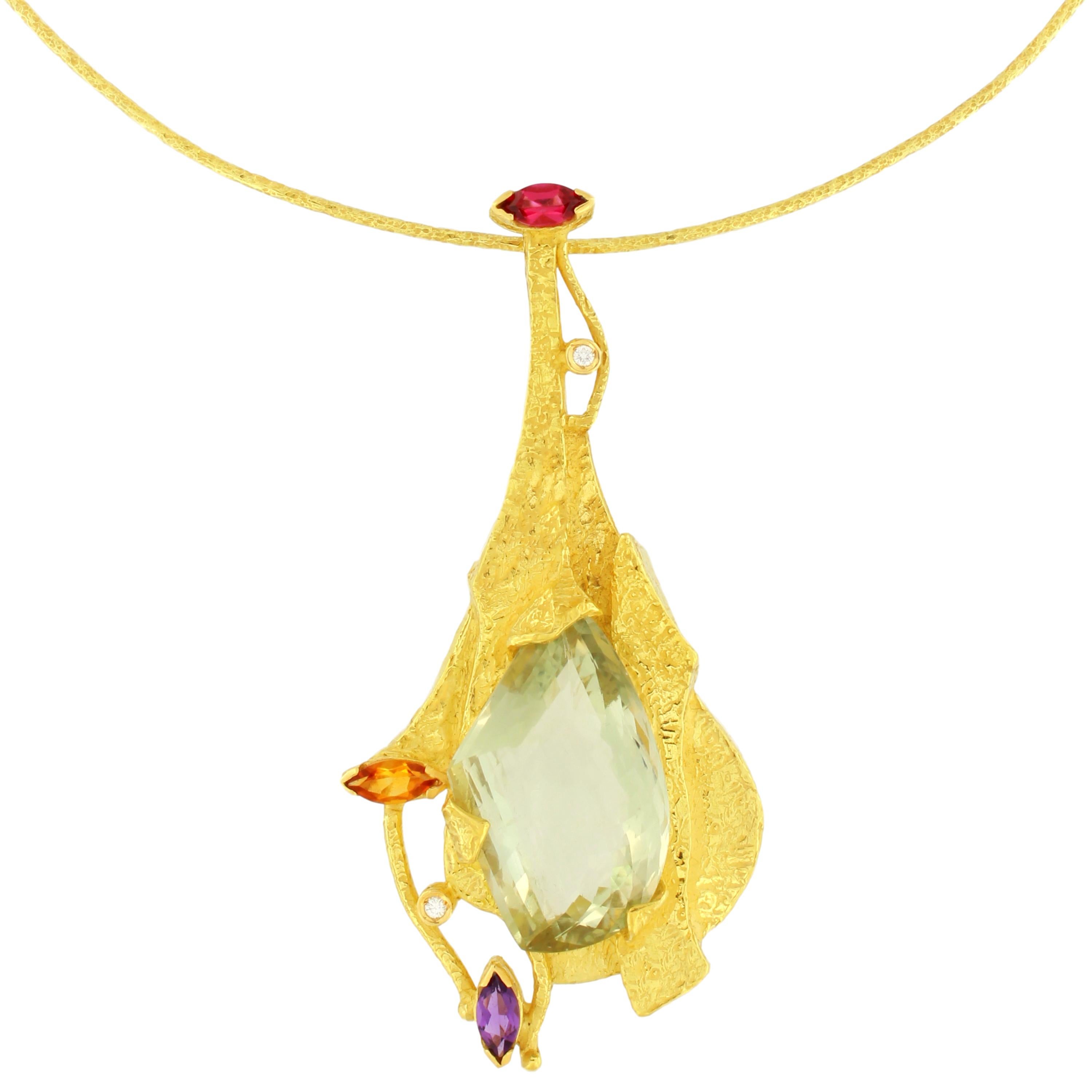 Exquisite Satin Yellow Gold Pendant Necklace embellished with Multi-Color Precious Gemstones, from Sacchi’s “Burlesque” Collection, hand-crafted with lost-wax casting technique.

Lost-wax casting, one of the oldest techniques for creating jewelry,