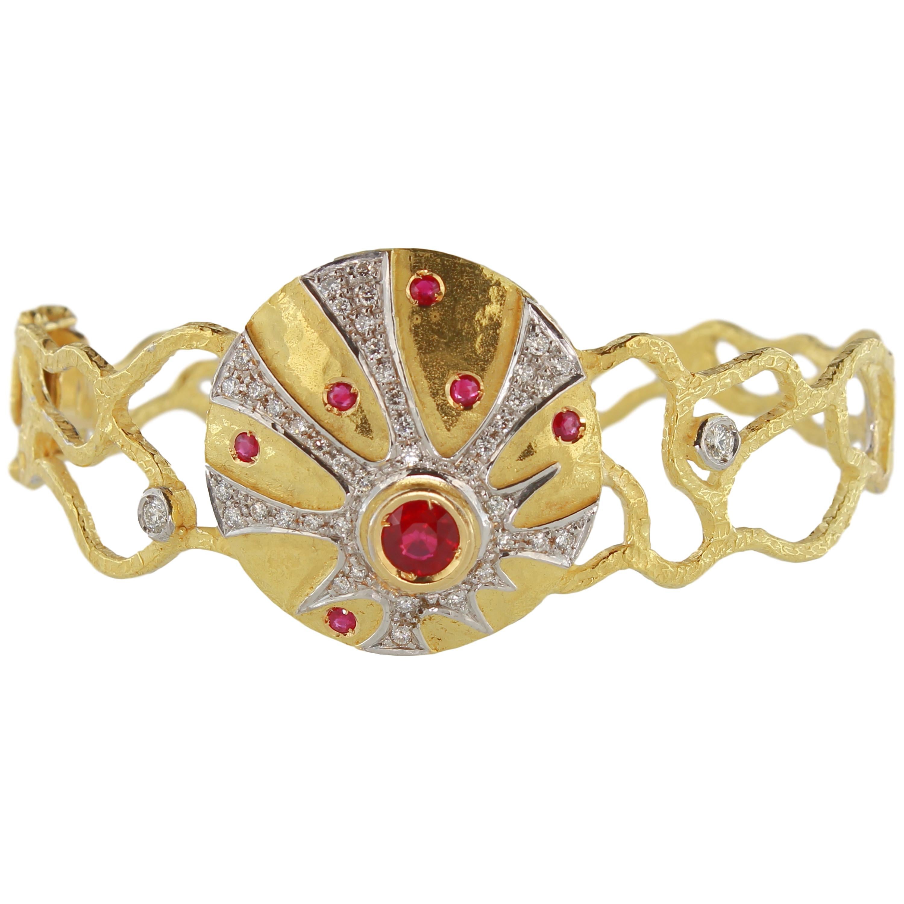 Elegant Ruby and Diamonds Satin Yellow Gold Cuff Bracelet, from Sacchi’s “Maya” Collection, hand-crafted with lost-wax casting technique.

Lost-wax casting, one of the oldest techniques for creating jewelry, forms the basis of Sacchi's jewelry