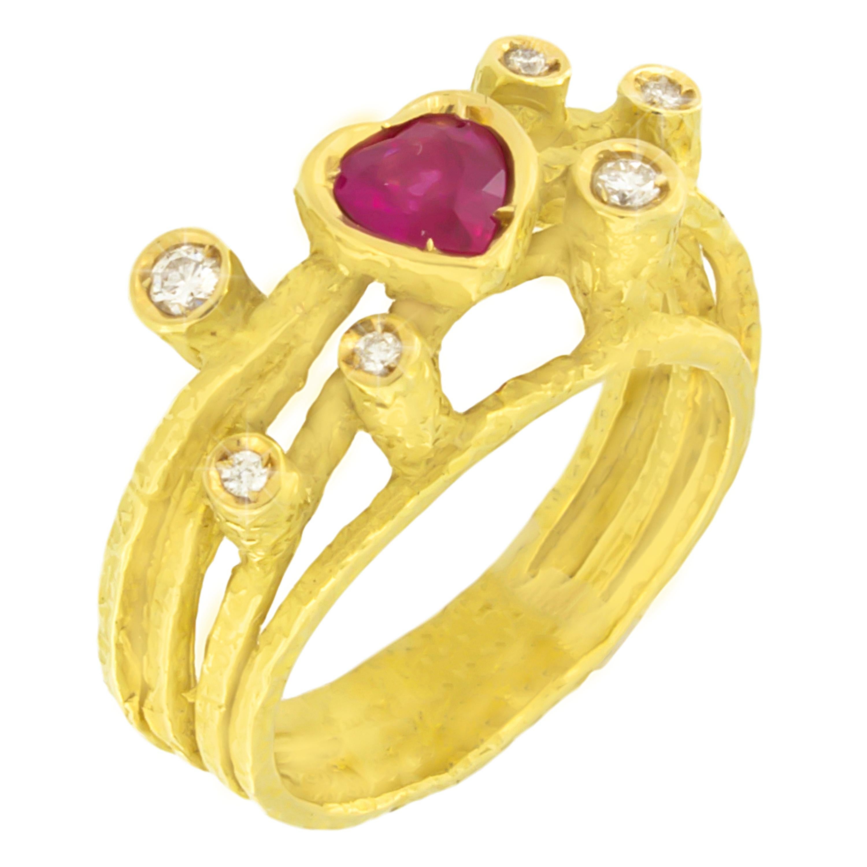 Lovely Heart Ruby and Diamonds Satin Yellow Gold Cocktail Ring, from Sacchi’s Universe Collection, hand-crafted with lost-wax casting technique.

Lost-wax casting, one of the oldest techniques for creating jewelry, forms the basis of Sacchi's