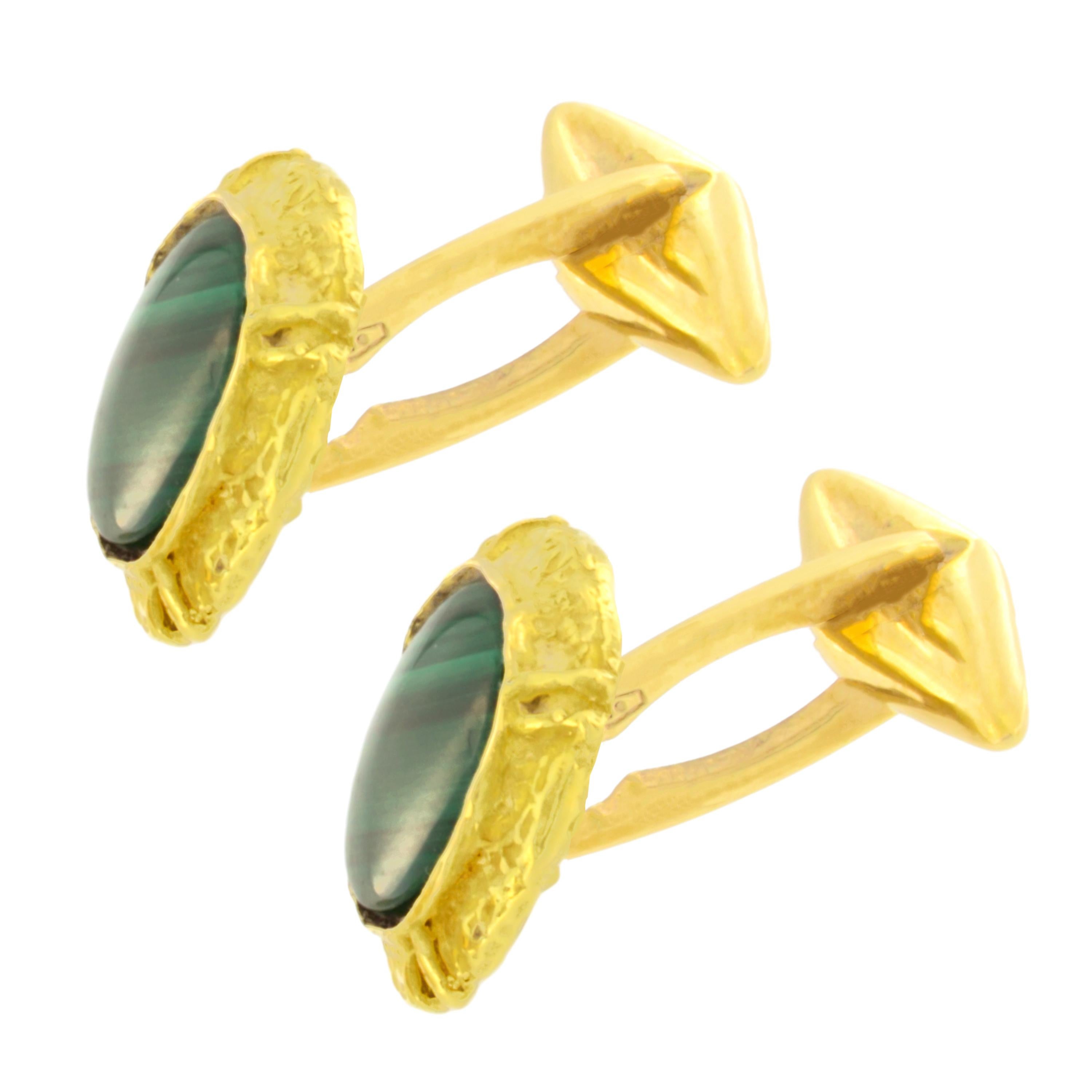 Malachite Gemstone Satin Yellow Gold Oval Cufflinks hand-crafted with lost-wax casting technique.

Lost-wax casting, one of the oldest techniques for creating jewellery, forms the basis of Sacchi's jewellery production. Modelling wax in the round