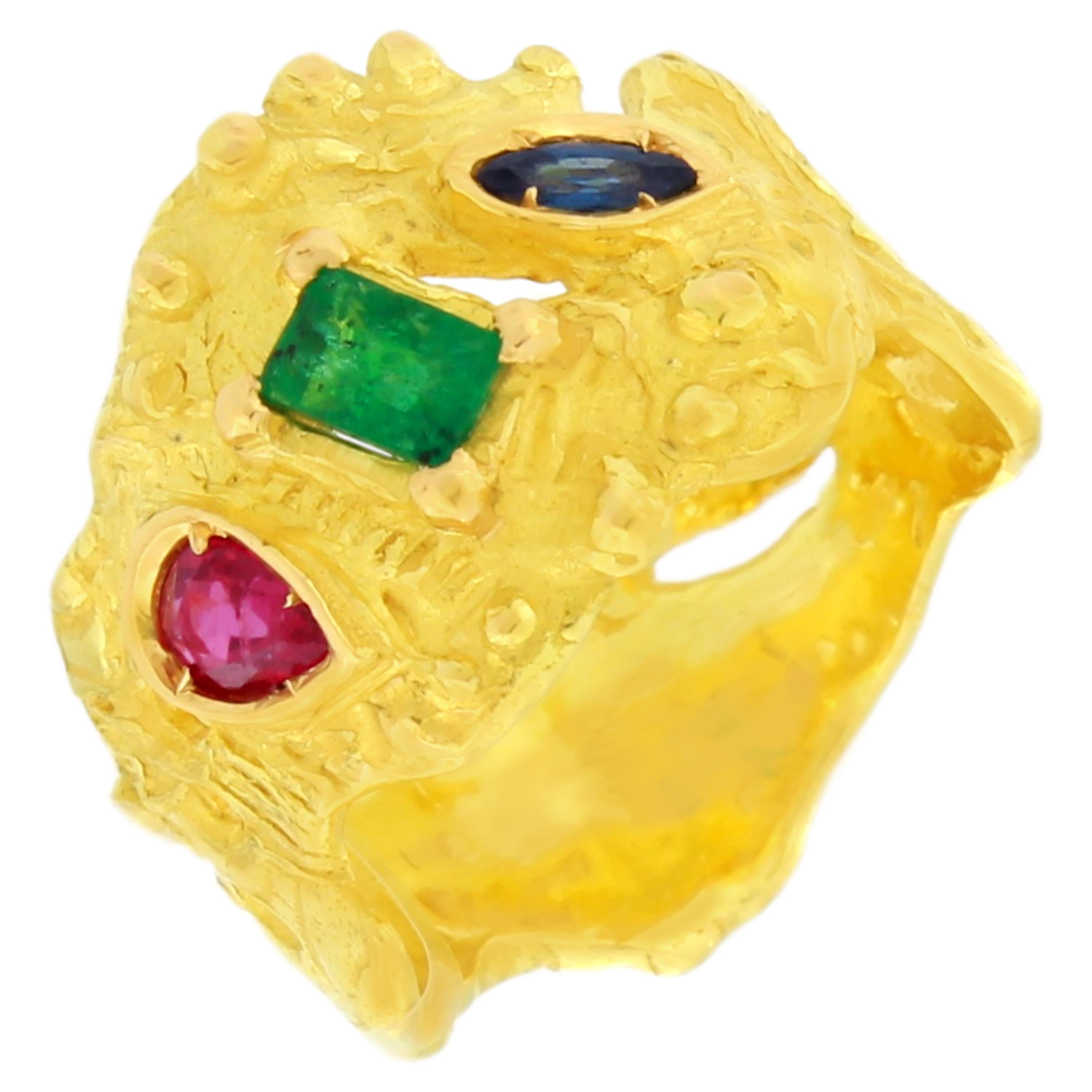 Multi-Color Precious Gemstones Satin Yellow Gold Band Ring, hand-crafted with lost-wax casting technique.

Lost-wax casting, one of the oldest techniques for creating jewelry, forms the basis of Sacchi's jewelry production. Modelling wax in the