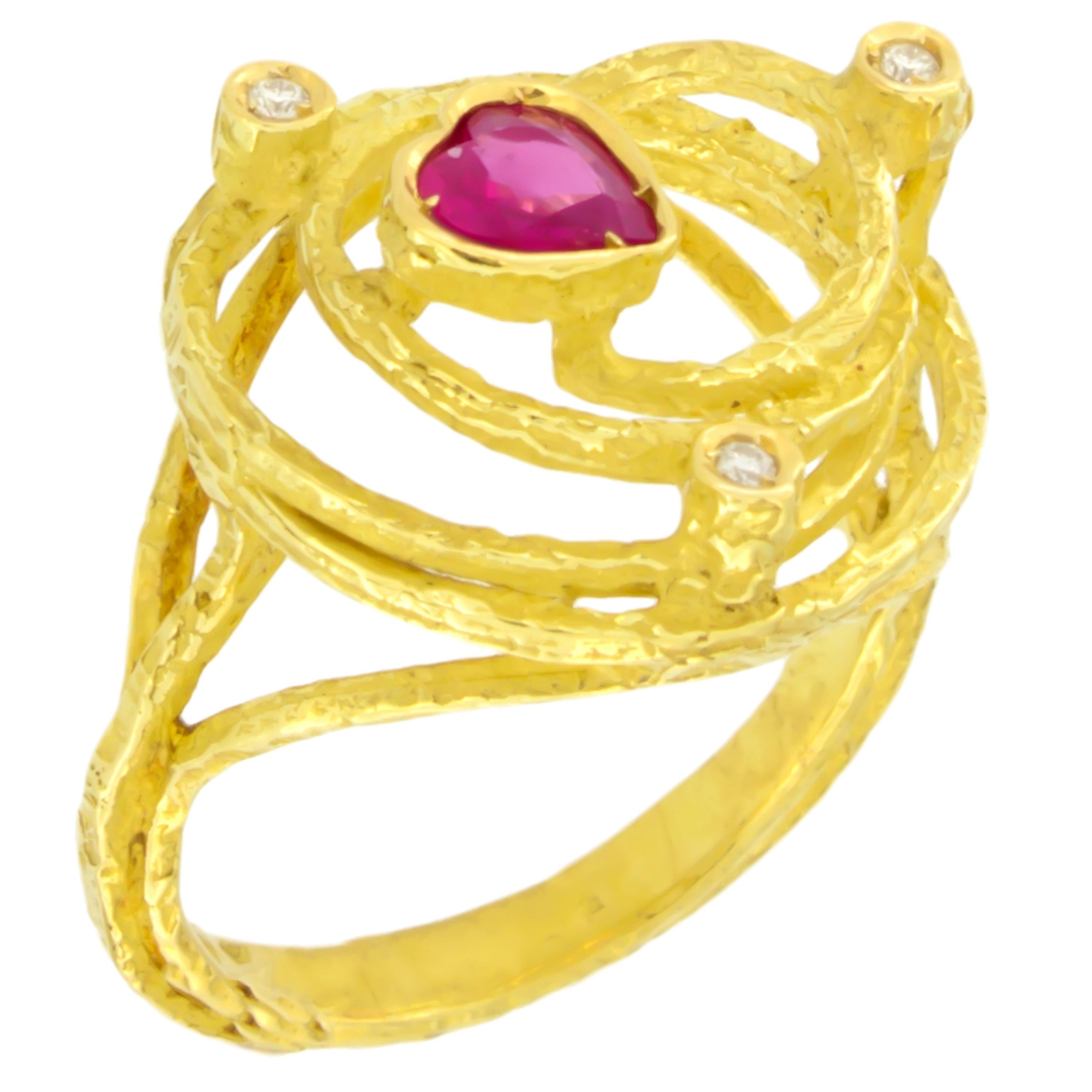 Lovely Small Size Heart Ruby and Diamonds Satin Yellow Gold Cocktail Ring, from Sacchi’s Universe Collection, hand-crafted with lost-wax casting technique.

Lost-wax casting, one of the oldest techniques for creating jewelry, forms the basis of
