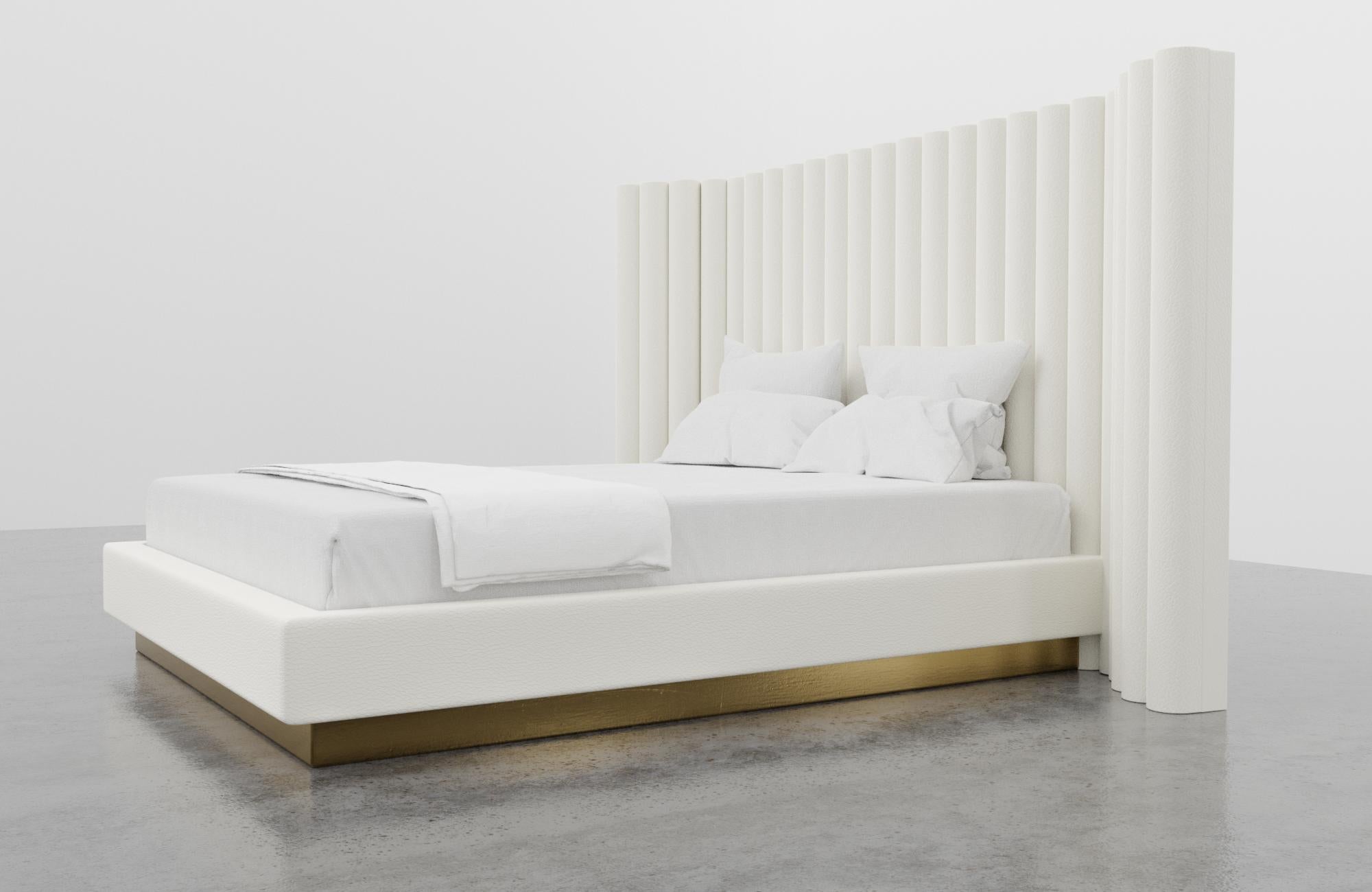SACHA BED - Modern Bed in Faux White Leather and Polished Bronze Base

The Sacha Bed is a modern and stylish piece of furniture that features a sexy, vertically channeled headboard and a fully upholstered platform system. The headboard height can