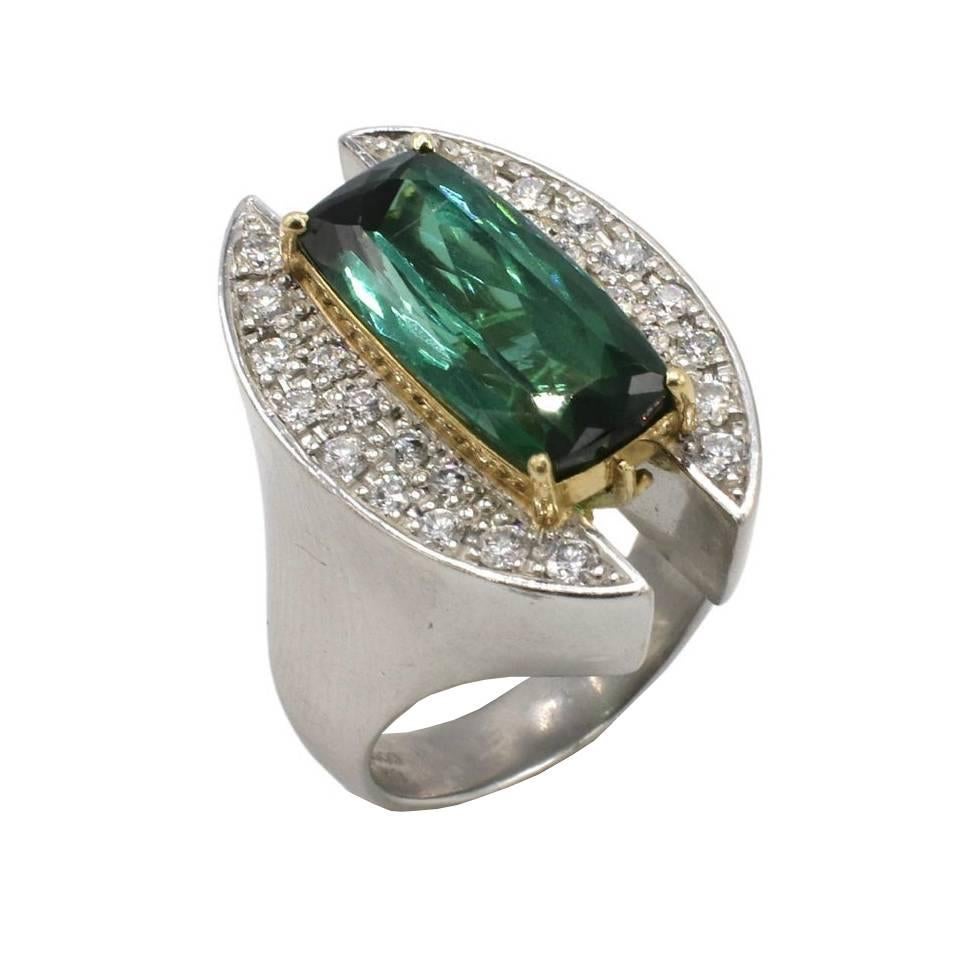 Sachi Platinum 7.12 Carat Tourmaline & Natural Diamond Cocktail Ring Size 8

Metal: Platinum & 18k yellow gold
Weight: 26.35 grams
Tourmaline: 7.12 carats
Diamonds: 0.93 carats total weight G VS
Ring size: 8
Signed: 