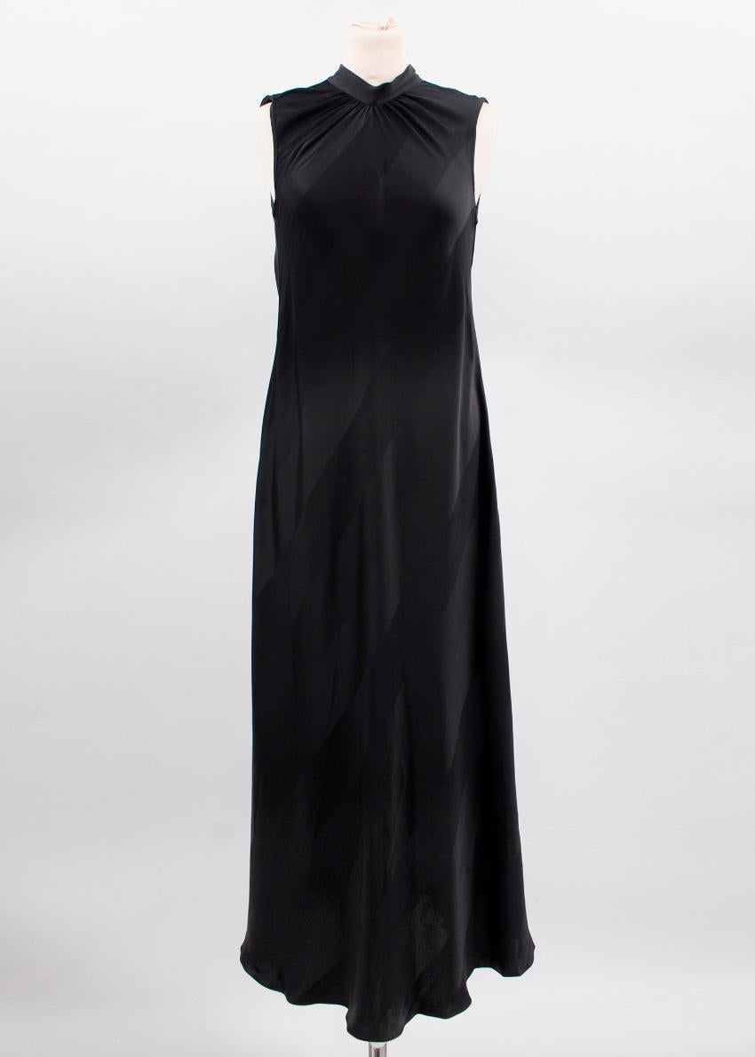 Sachin & Babi black silk gown 

Featuring:
-sleeveless design
-back tie neck fastening
-back slit detail

Please note that this is sample pieces and the sample sizes are a UK 8/10. 

Please note, these items are pre-owned and may show signs of being