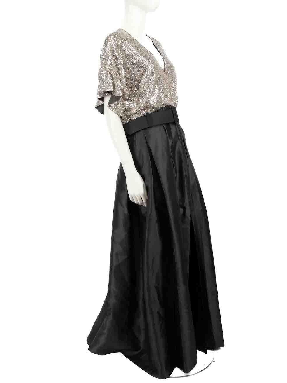 CONDITION is Never worn, with tags. No visible wear to dress is evident on this new Sachin & Babi designer resale item.
 
 
 
 Details
 
 
 Model: Simone gown
 
 Grey
 
 Polyester
 
 Gown
 
 Silver sequinned top
 
 V-neck
 
 Short ruffle sleeves
 
