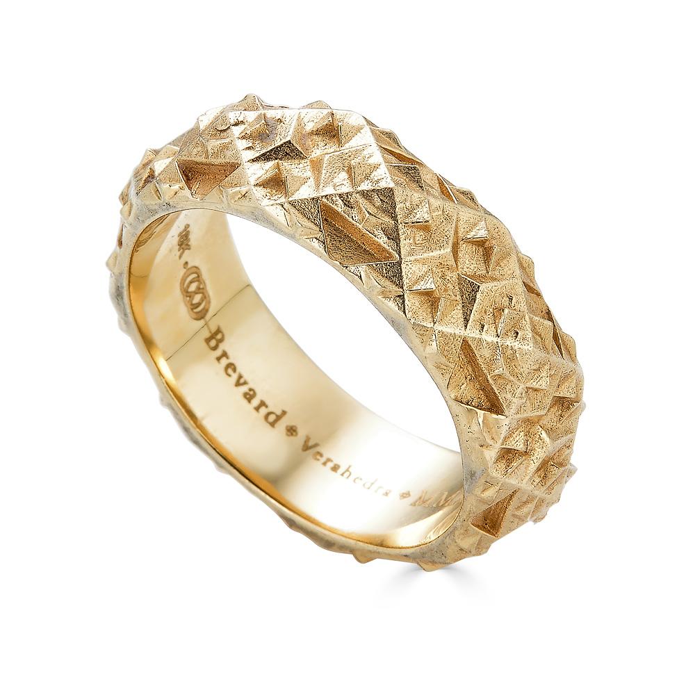 This Sacred Band Ring features fractal geometric patterns inspired by the Borobudur temple in Indonesia. These fractal temples were used as meditation spaces to empower the individual and this is what designer John Brevard intends with these
