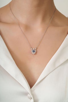 Sacred Heart Blue Sapphire & Diamond Sunburst Pendant Necklace in 14K White Gold