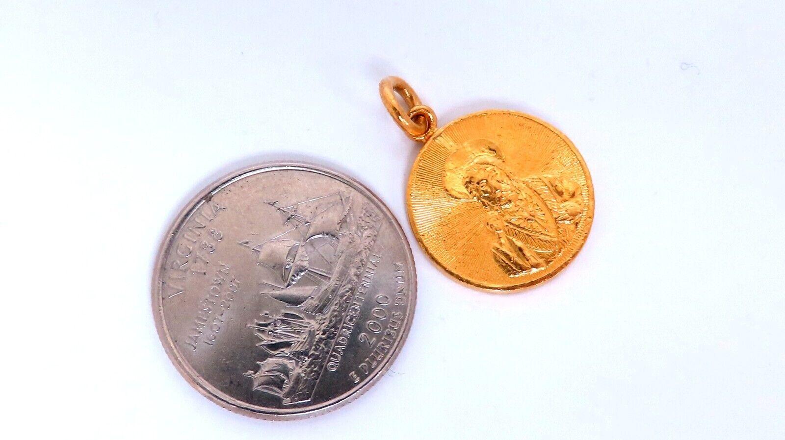 Sacred Heart Reversible Charm 

 24kt Yellow Gold

Weight: 6.4 Grams

17mm diameter pendant