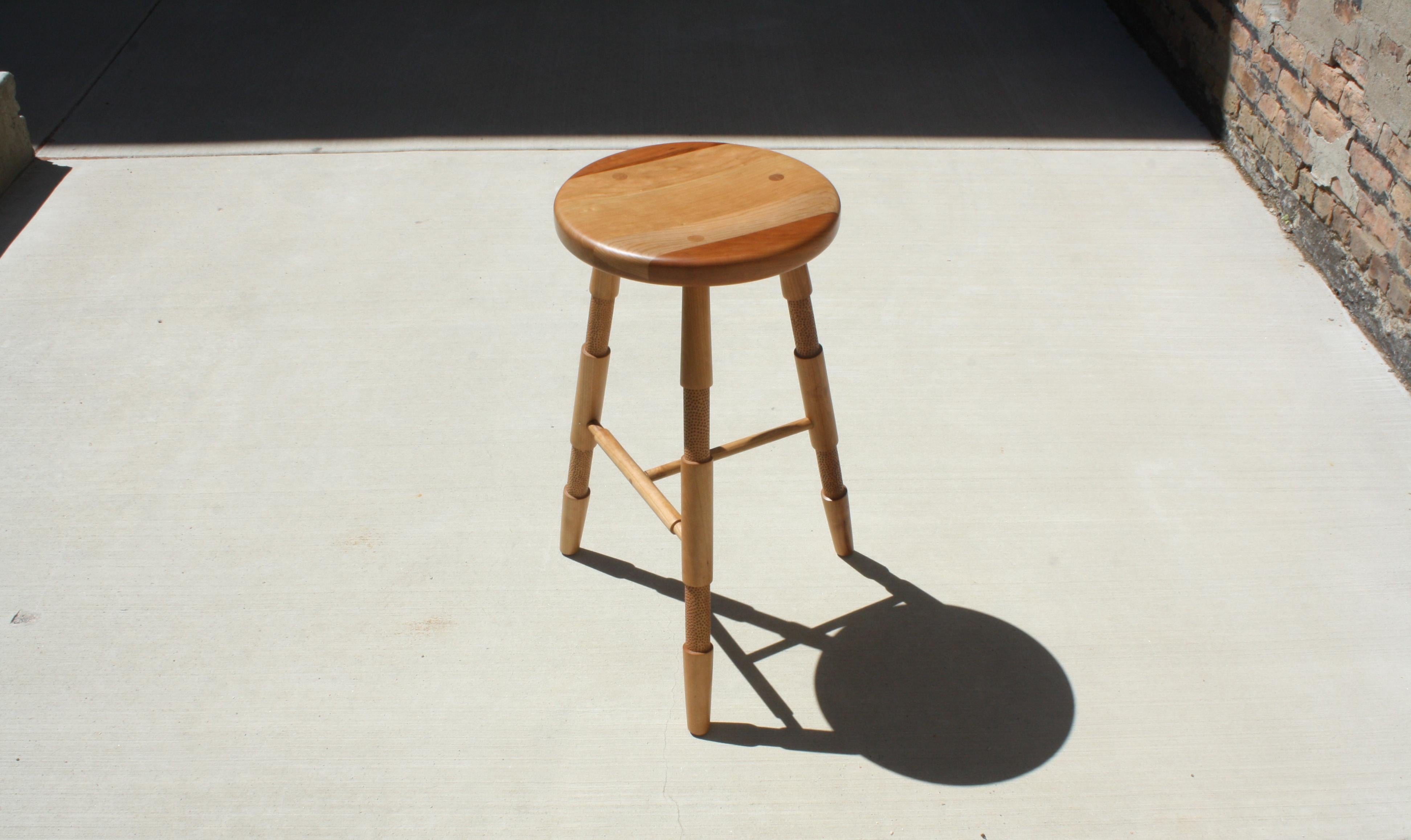 American Saddle Handcarved Counter Height Wood Stool by Laylo Studio in Bleached Maple For Sale