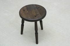 Saddle, Handmade Oxidized Oak Stool with Textured Legs and a Carved Seat