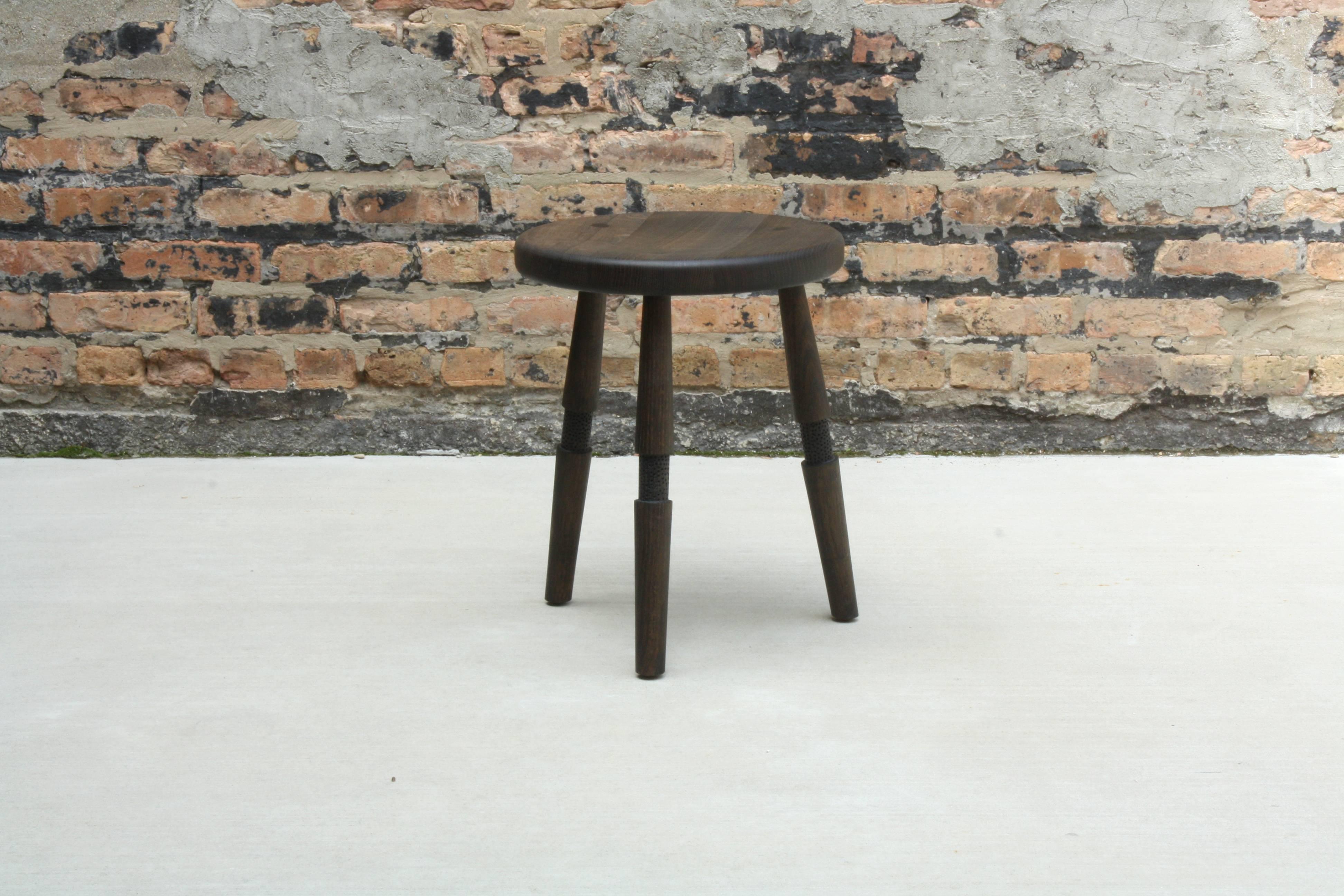 Modern Saddle, Handmade Oxidized Oak Stool with Textured Legs and a Carved Seat For Sale