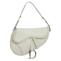 Saddle in white leather
