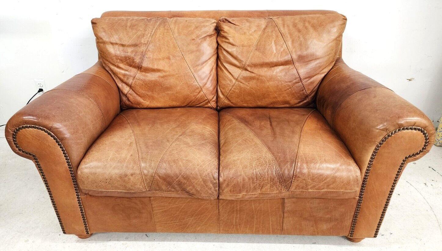 Offering One Of Our Recent Palm Beach Estate Fine Furniture Acquisitions Of A 
Soft Saddle Leather Settee Love Seat By SOFT LINE of Italy
If you could sit in a broken-in baseball glove, you would know what it is like to sit on this sofa.
Soft Line