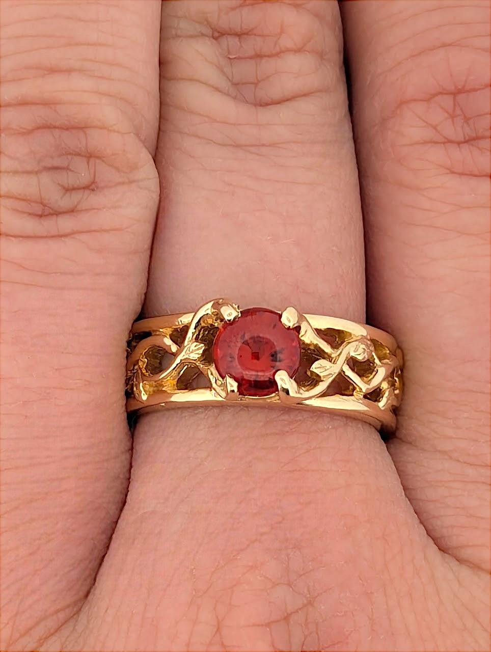 Celebrate love and timeless elegance with this stunning 14k Yellow Gold Ruby Ring. Featuring a single, radiant ruby in a simple yet sophisticated setting, this ring is perfect for those who value classic beauty with a touch of uniqueness. The
