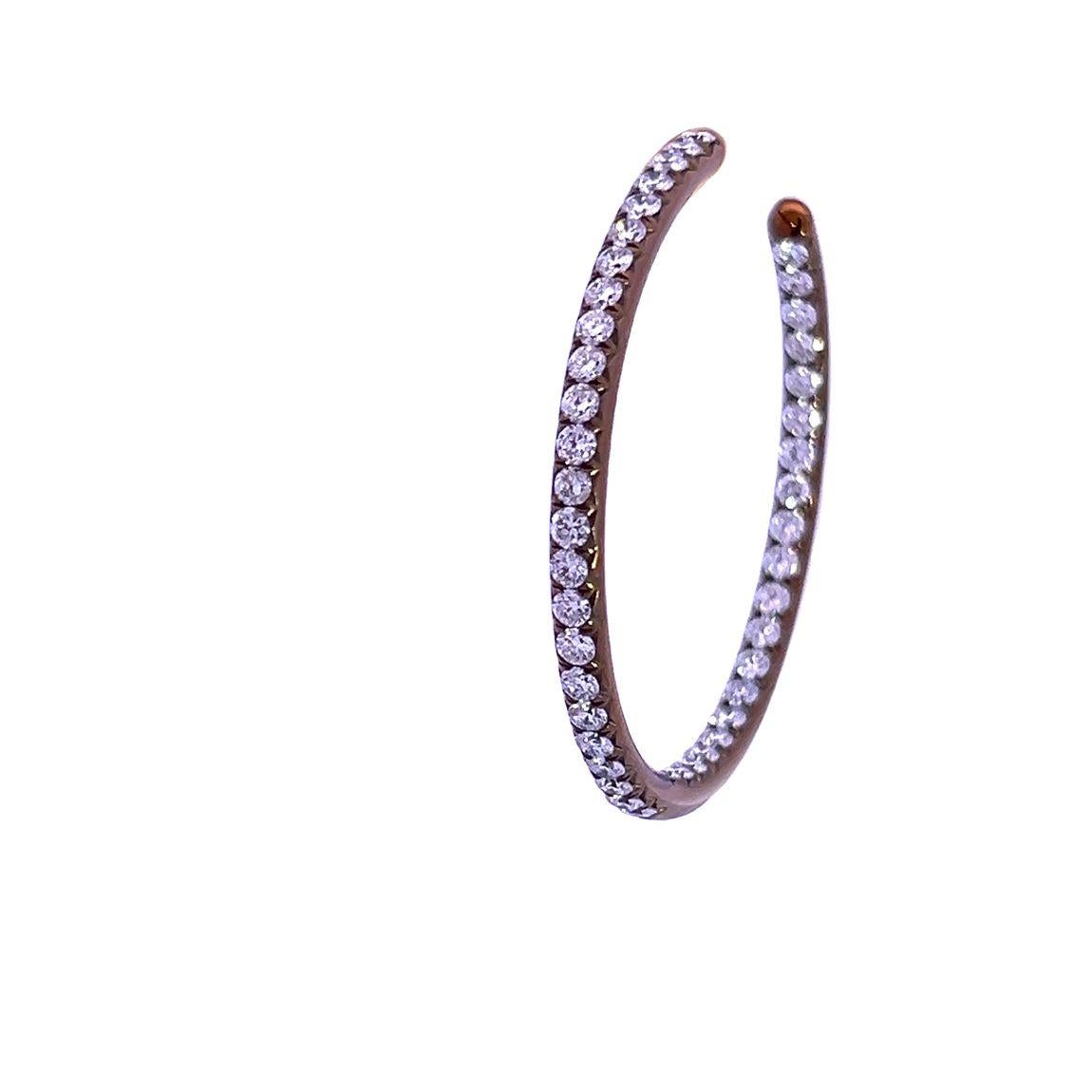 Sade, the singer, commissioned her iconic diamond hoops from us, and we have re-imagined them to be able to offer bespoke hand made diamond hoop earrings. 
These diamond hoop earrings are 3mm wide with a 36mm diameter.
The rounded design of the