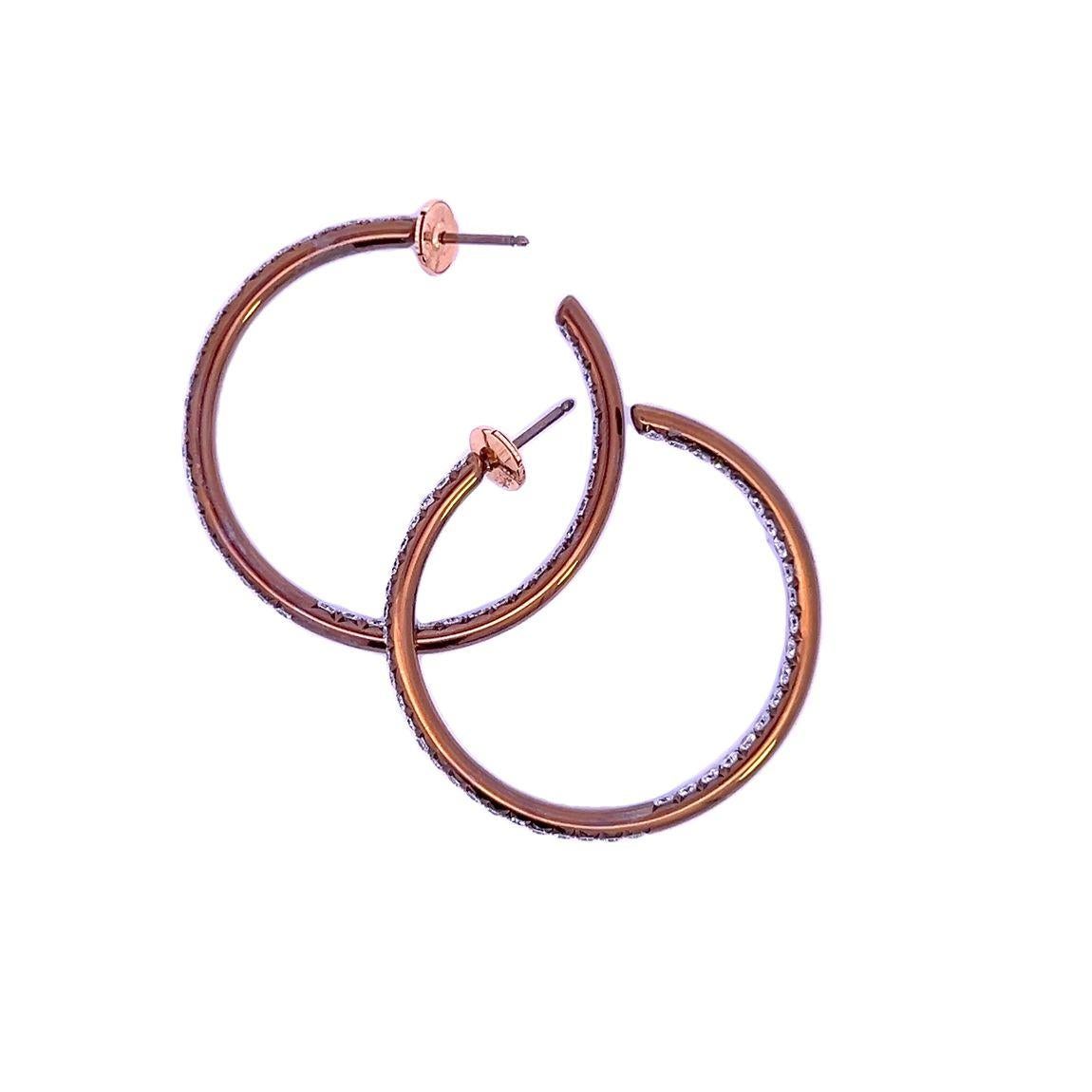 Modern Sade Diamond Hoop Earrings set with D-F colour diamonds in 18 karat yellow gold For Sale