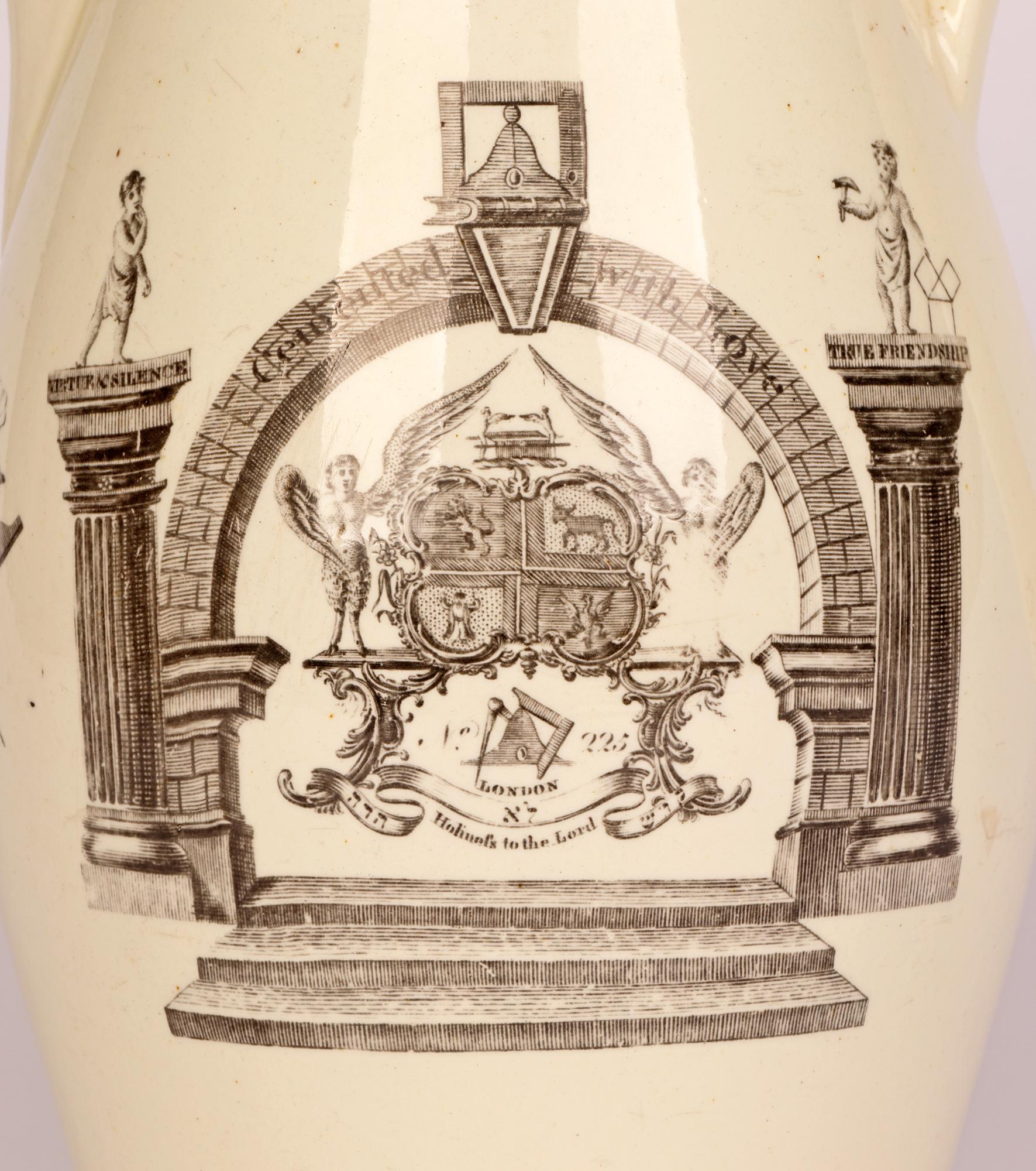 A rare large creamware pottery jug Masonic printed with the London arms of the Antients or the Athol Grand Lodge attributed to Sadler and Green and dating from the latter 18th century. The lightly potted jug is black printed to either side and below