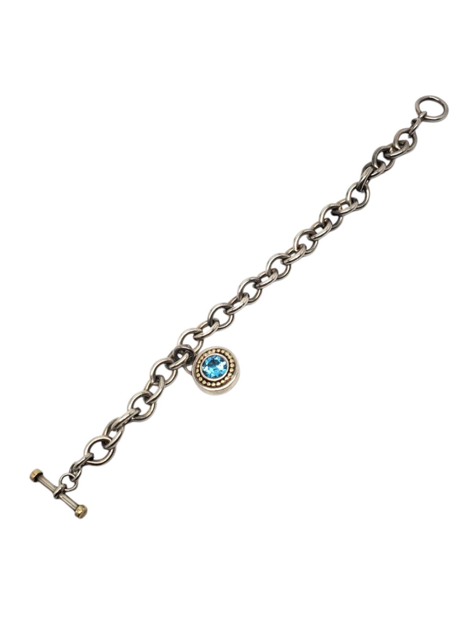 Sadye L Vassil Sterling & 14K Gold Plated Blue Topaz Charm Bracelet

This lovely link bracelet features a blue topaz (7.8 mm x 8.1 mm) charm with 14K plated rope design in sterling silver with a toggle clasp by Sadye L Vassil.

Size: 8
