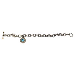 Sadye L Vassil Pulsera con dije de topacio azul chapada en oro de 14 quilates y en plata de ley #20745
