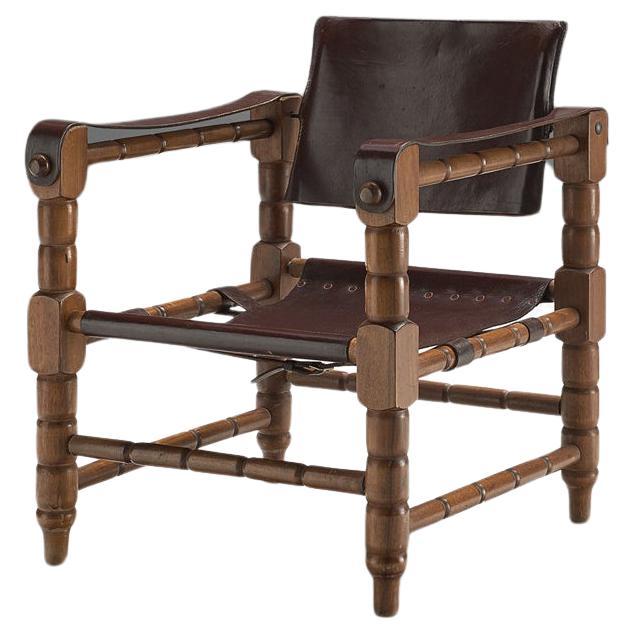 Safari Armchair in Brown Leather with Sculptural Wooden Frame For Sale